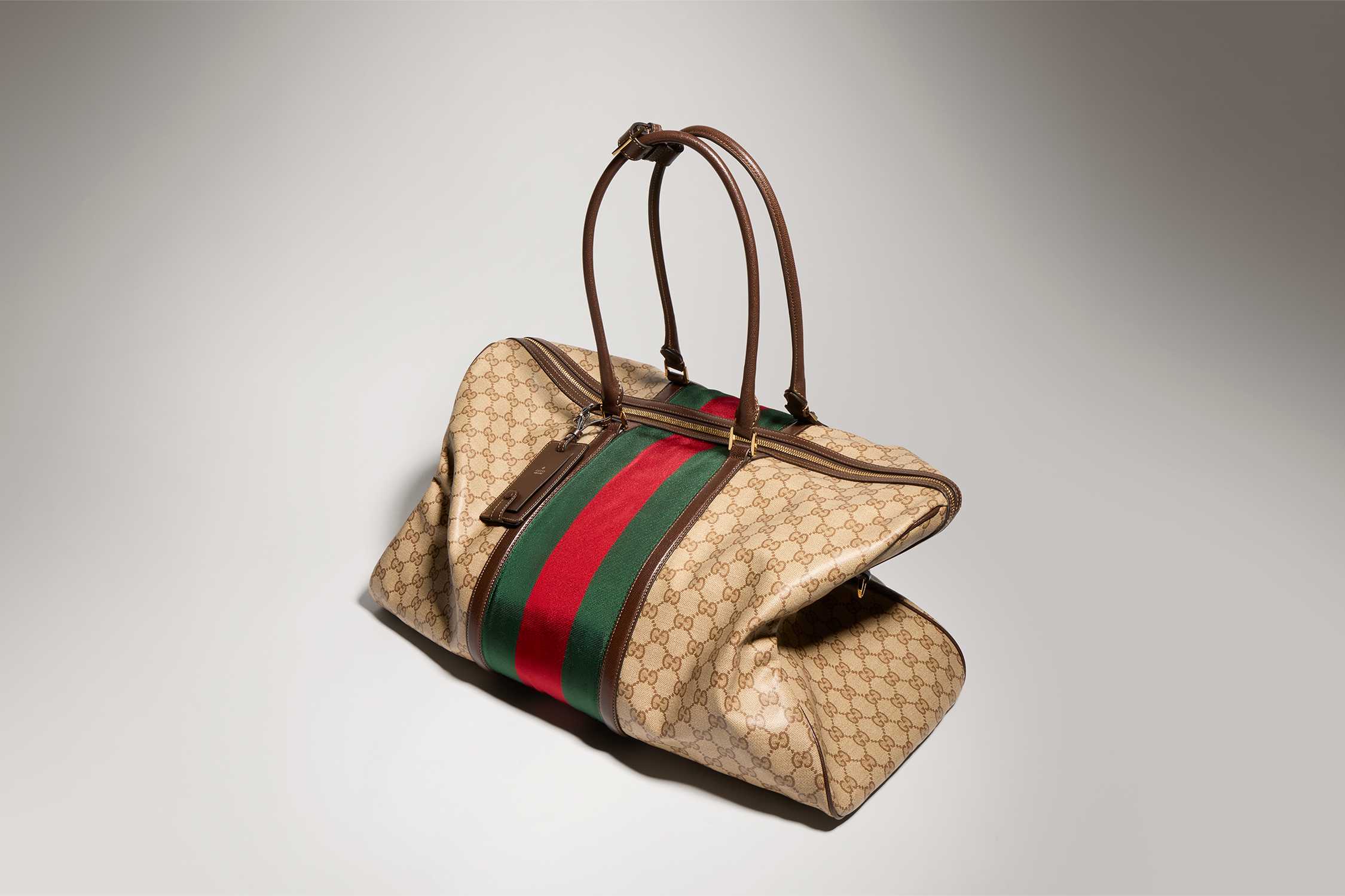 Beige Gucci GG Web duffle bag