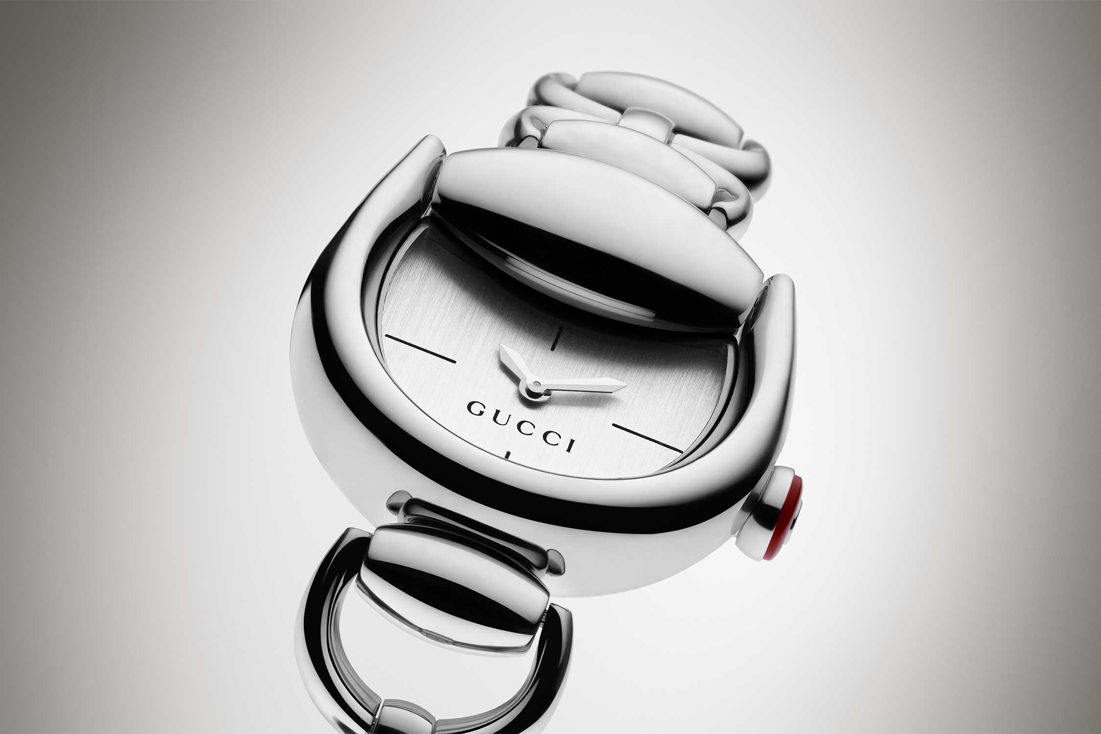Silver Gucci watch red crown