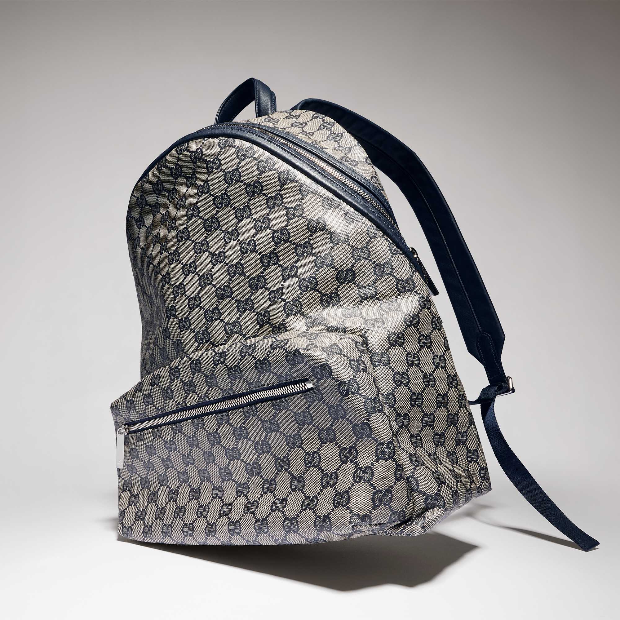 Black Gucci backpack with stripes