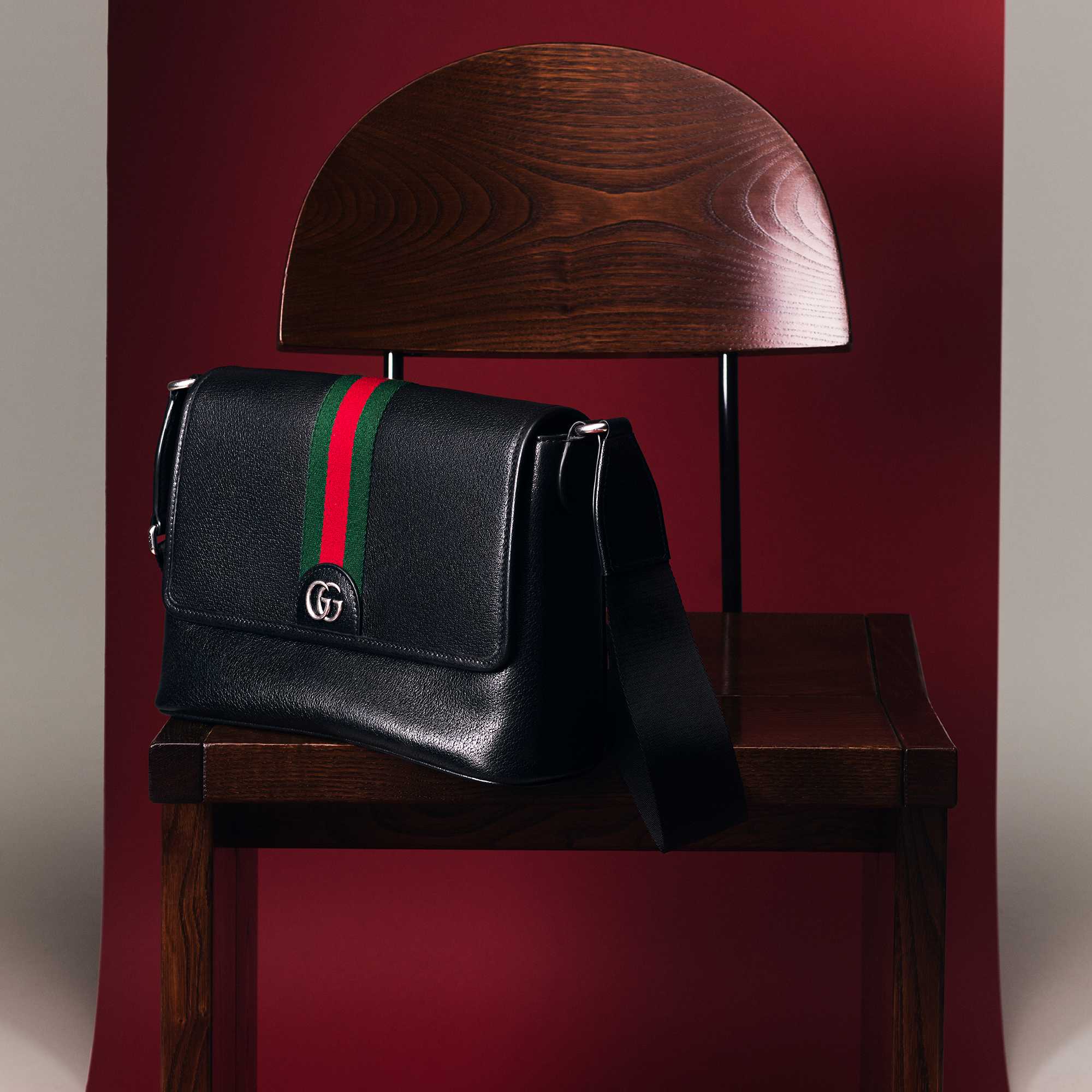 Black Gucci bag with striped detail