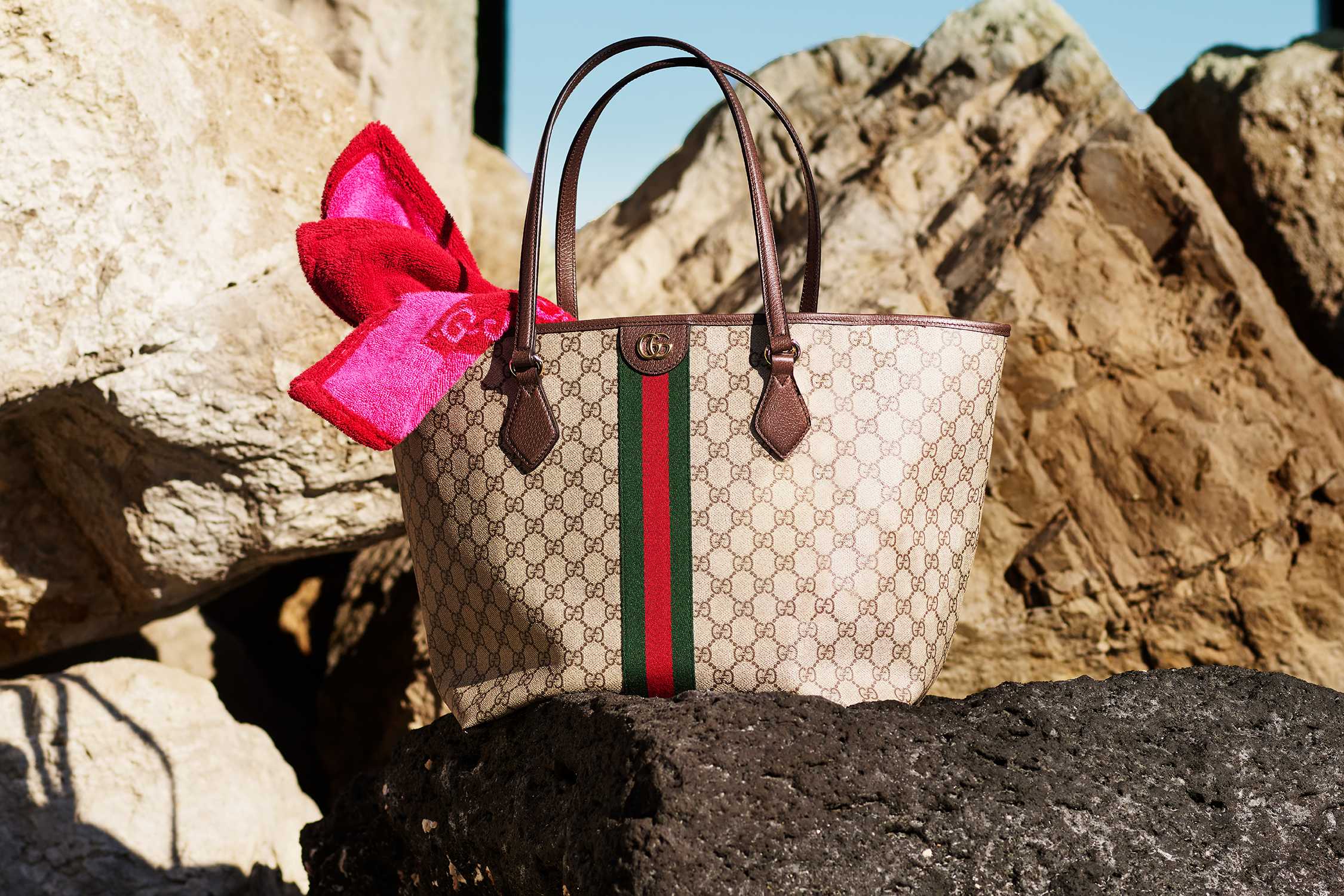 Gucci tote with red scarf