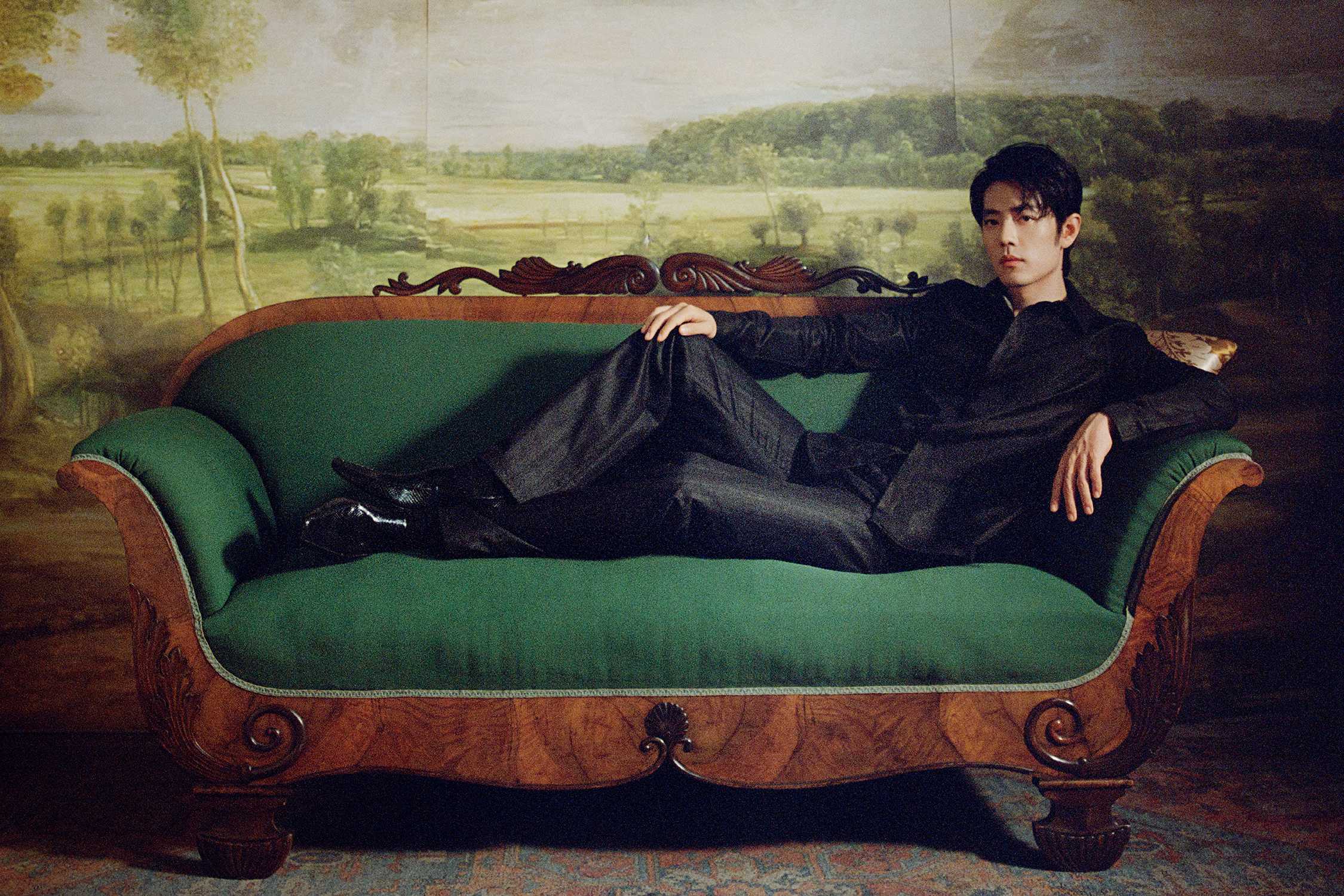 Man in black Gucci outfit