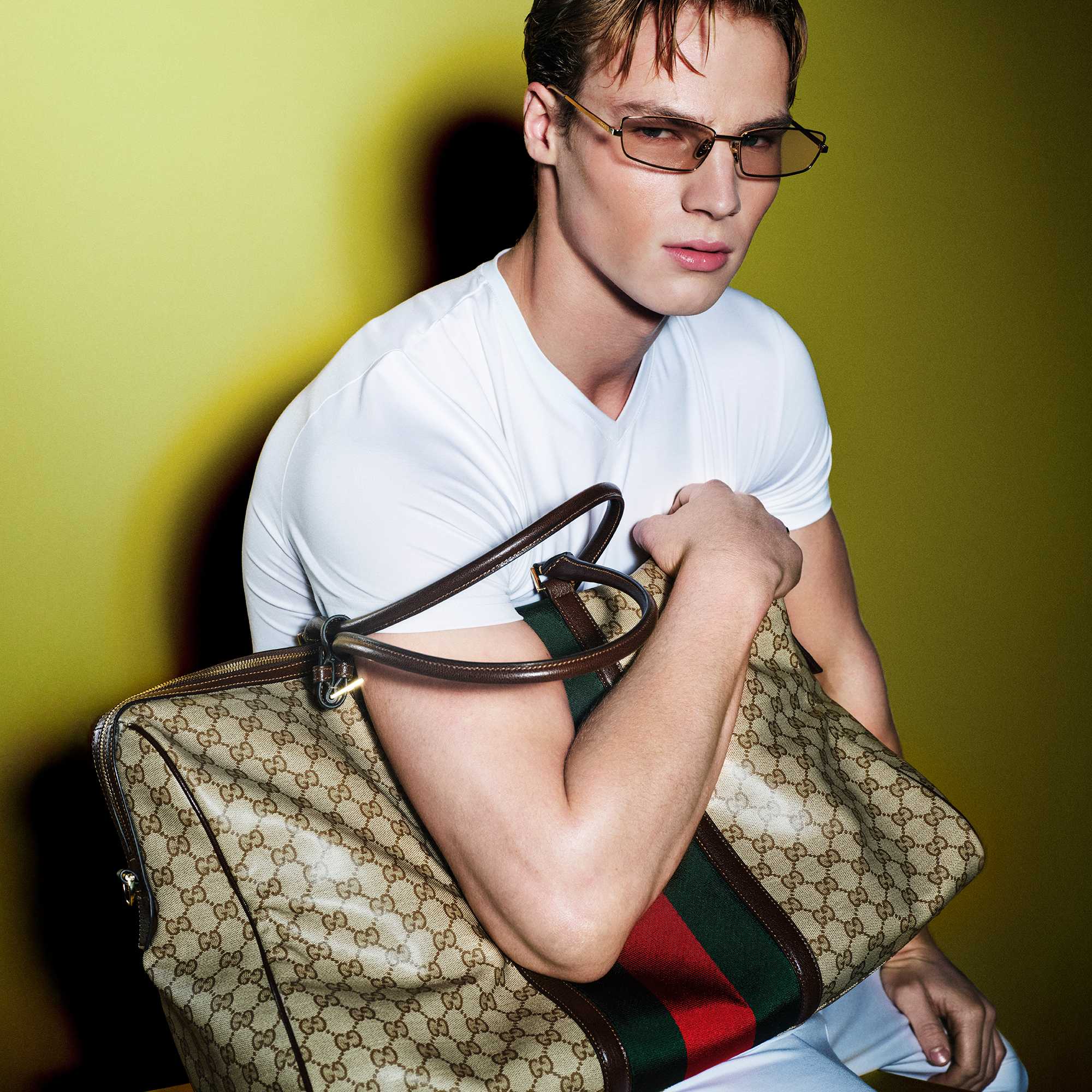 Beige Gucci bag with stripes