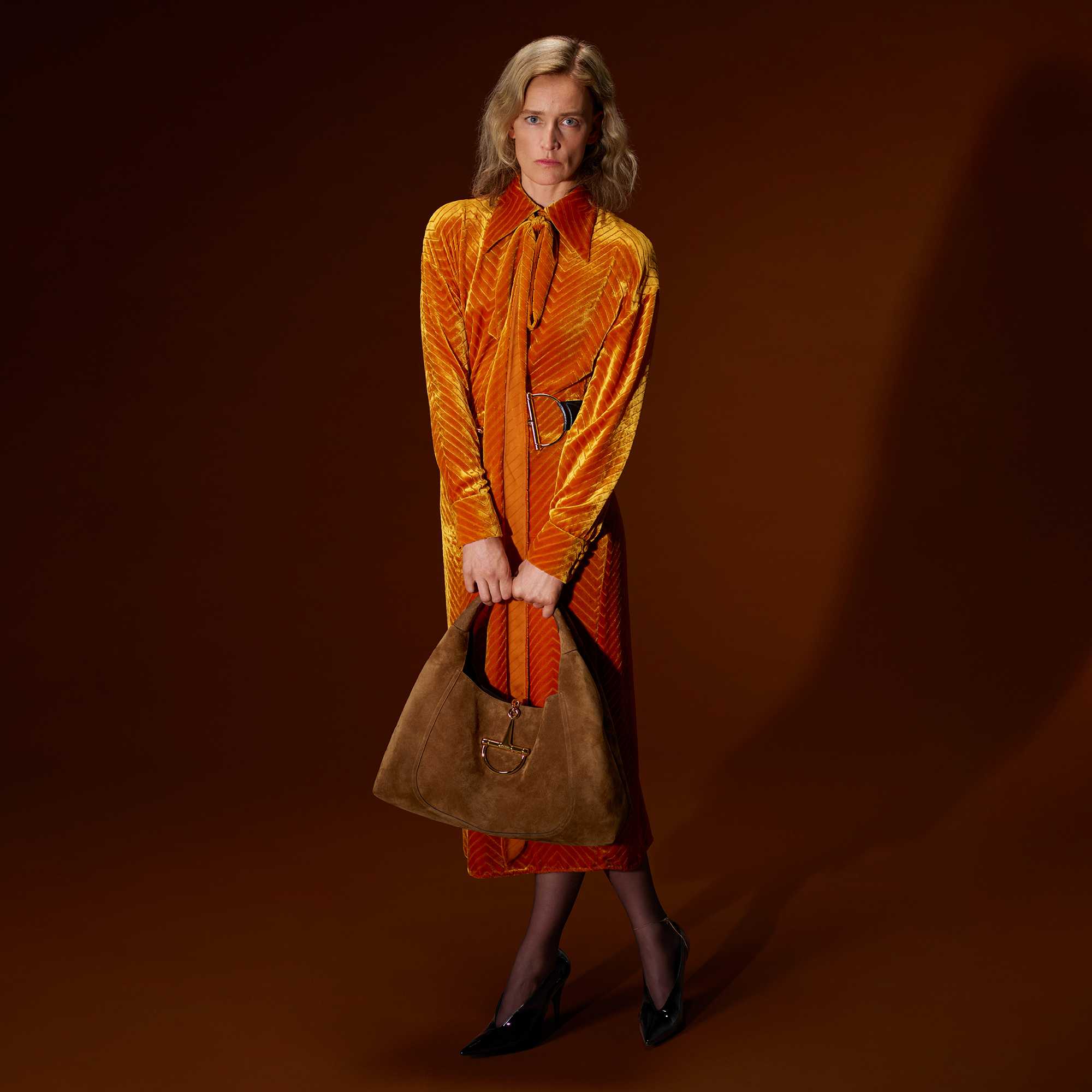 Gucci luxury fashion collection displayed.