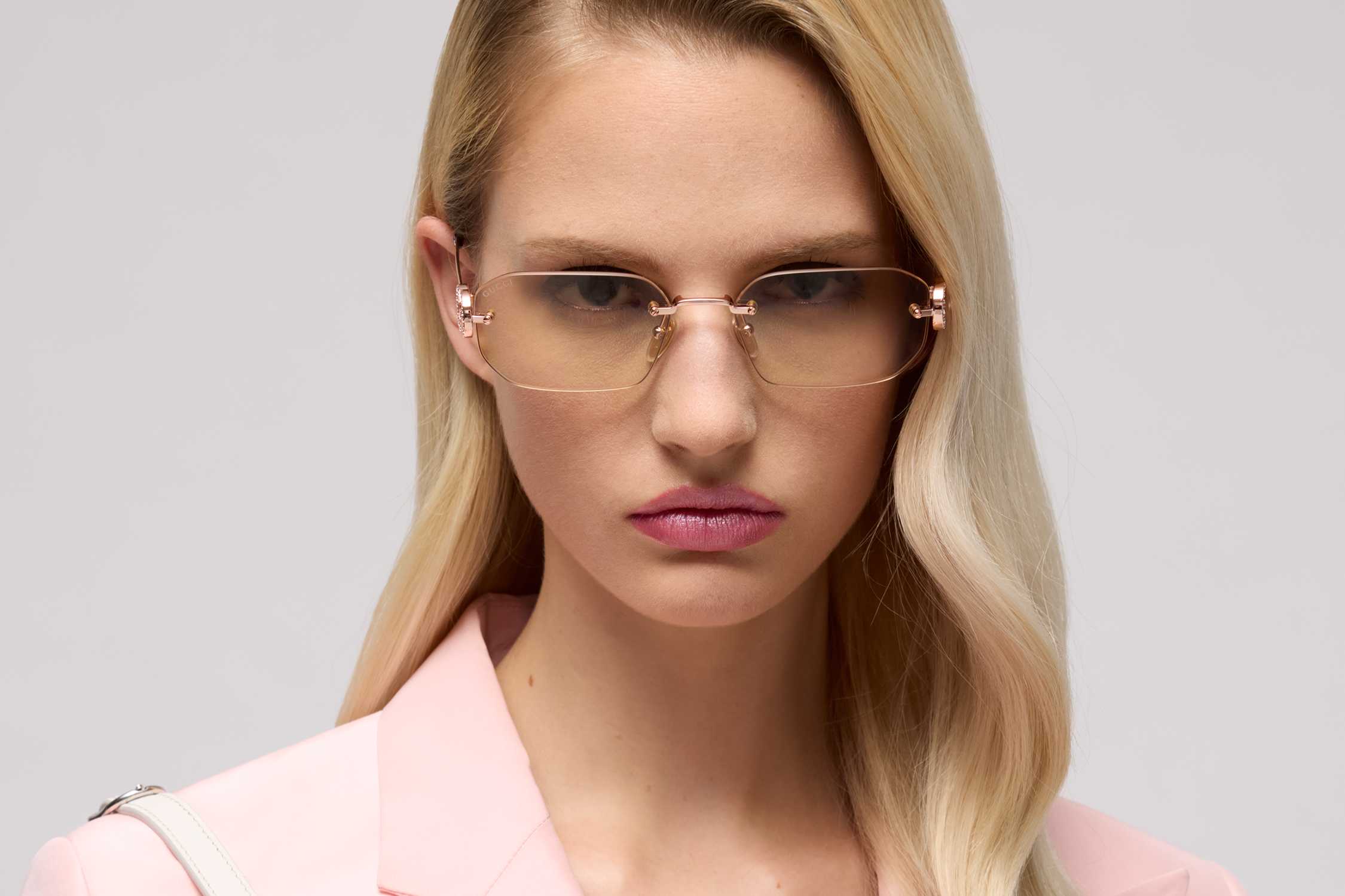 Rose gold rimless Gucci glasses