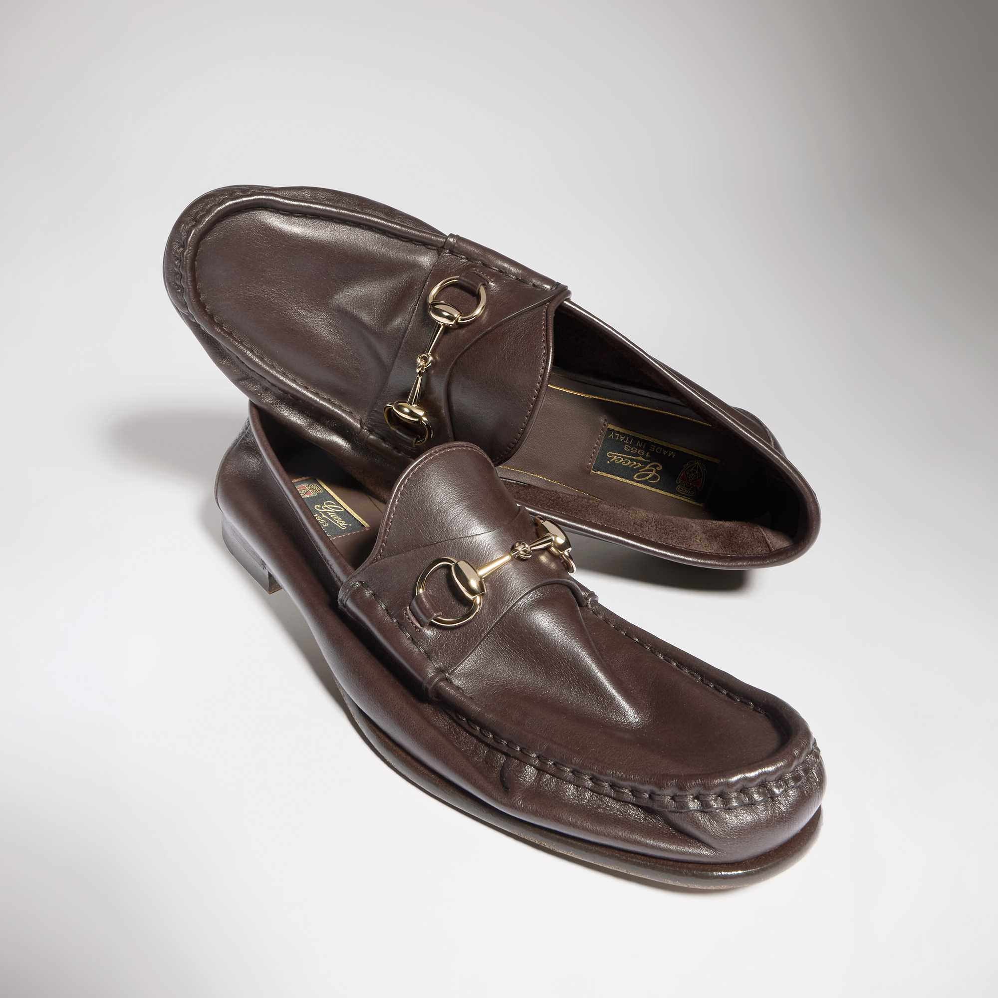 Brown Gucci horsebit leather loafers