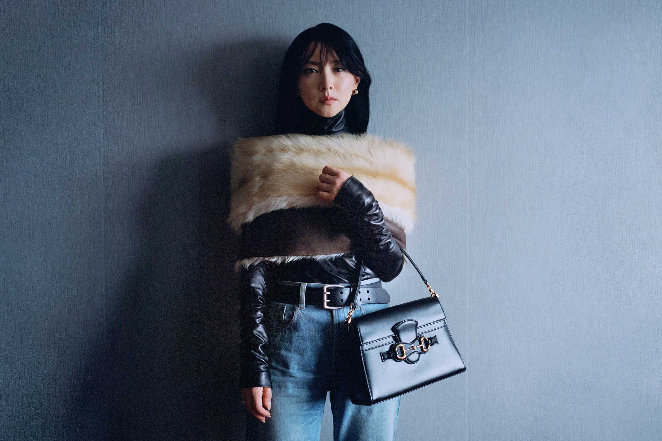 Black Gucci handbag gold hardware