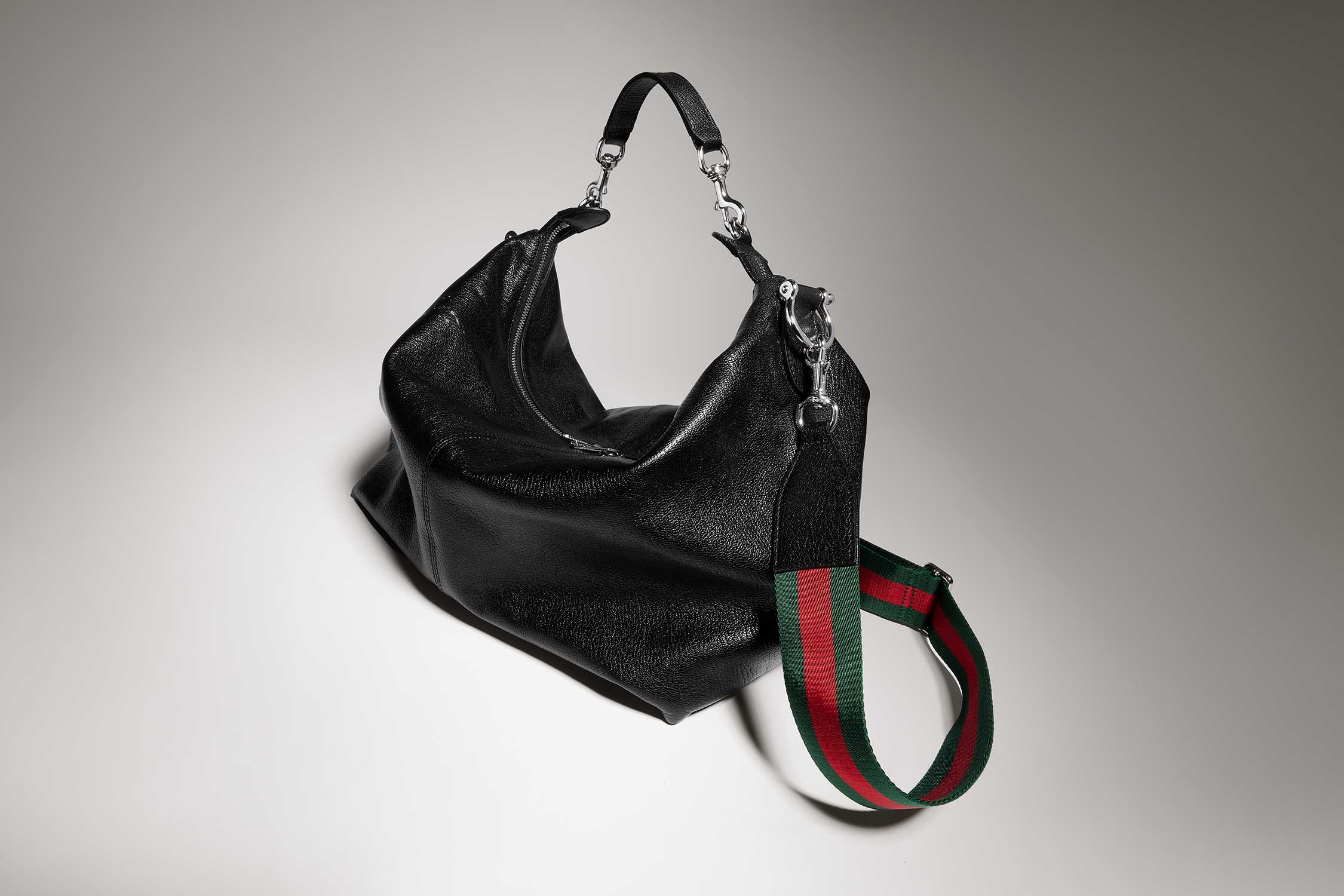 Black Gucci bag red green strap
