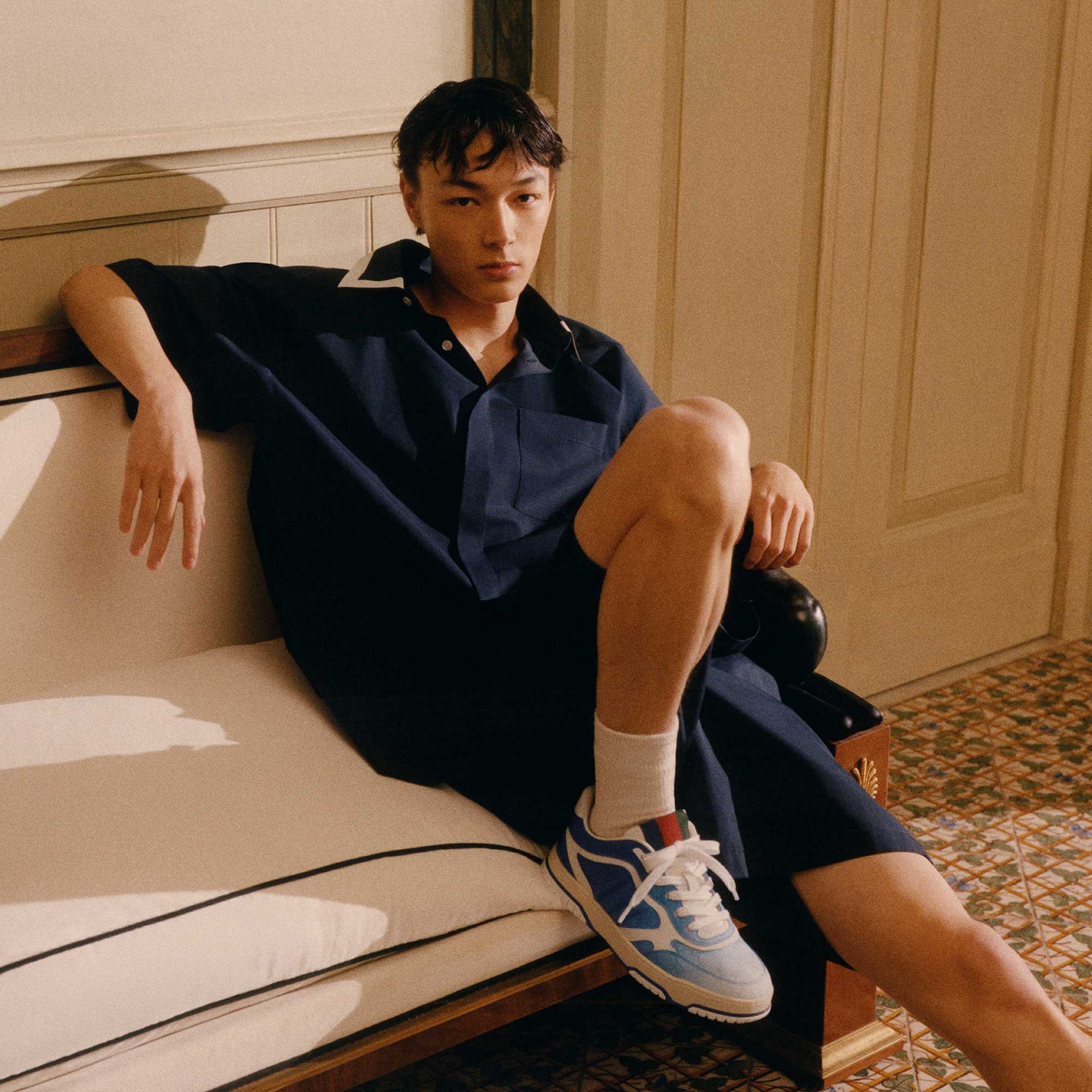 Blue Gucci sneakers with tricolor detail