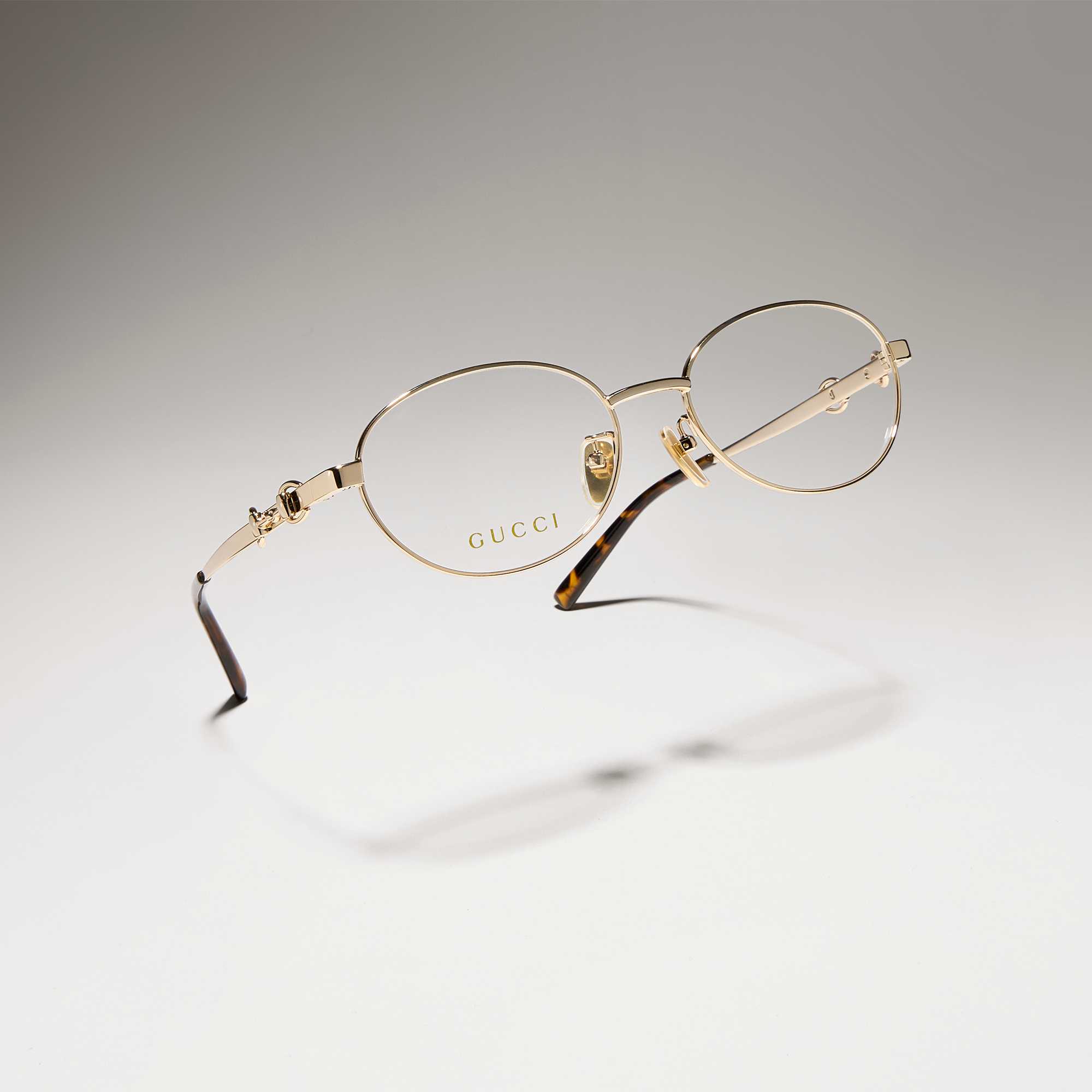 Gucci glasses with burgundy jacket