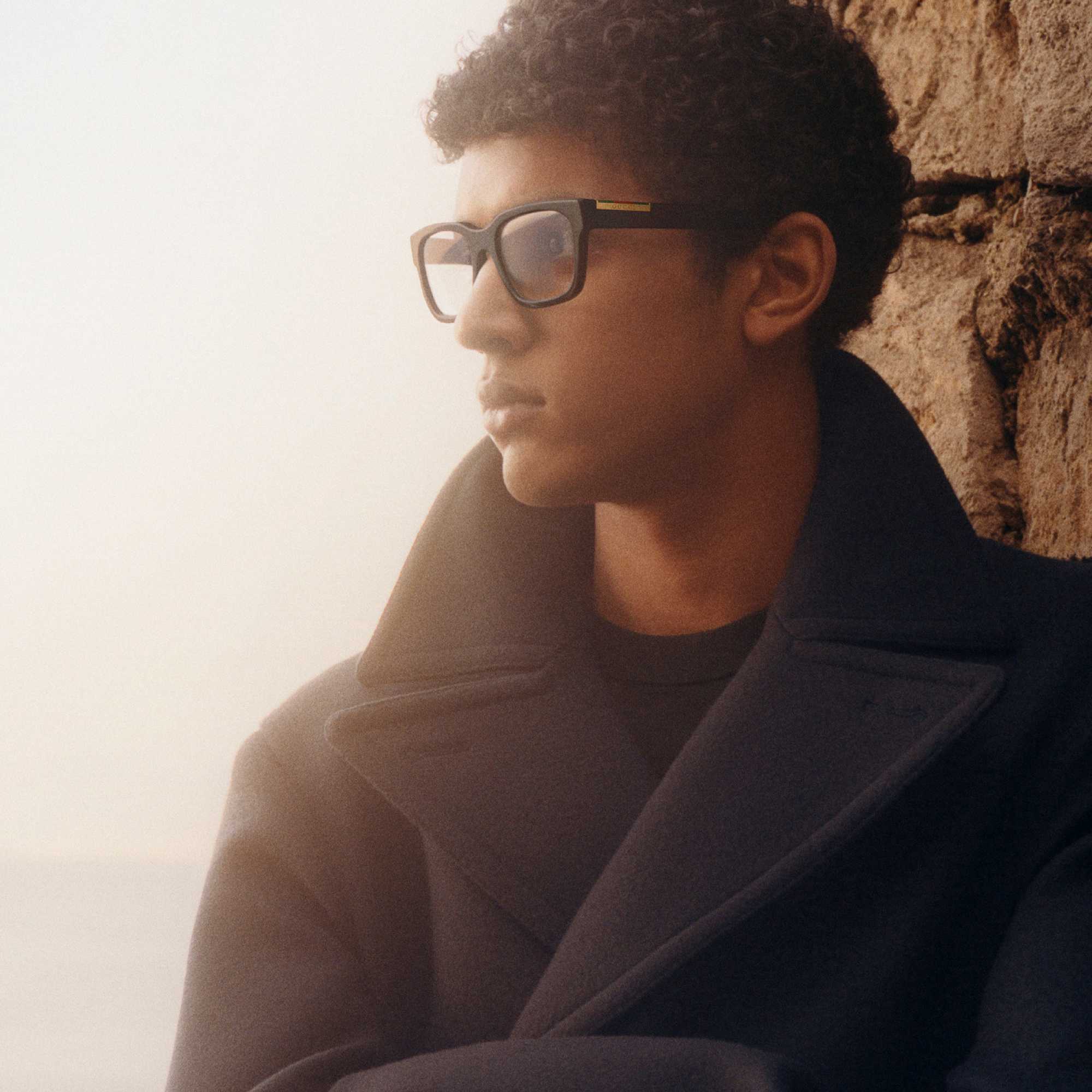 Black Gucci glasses with red