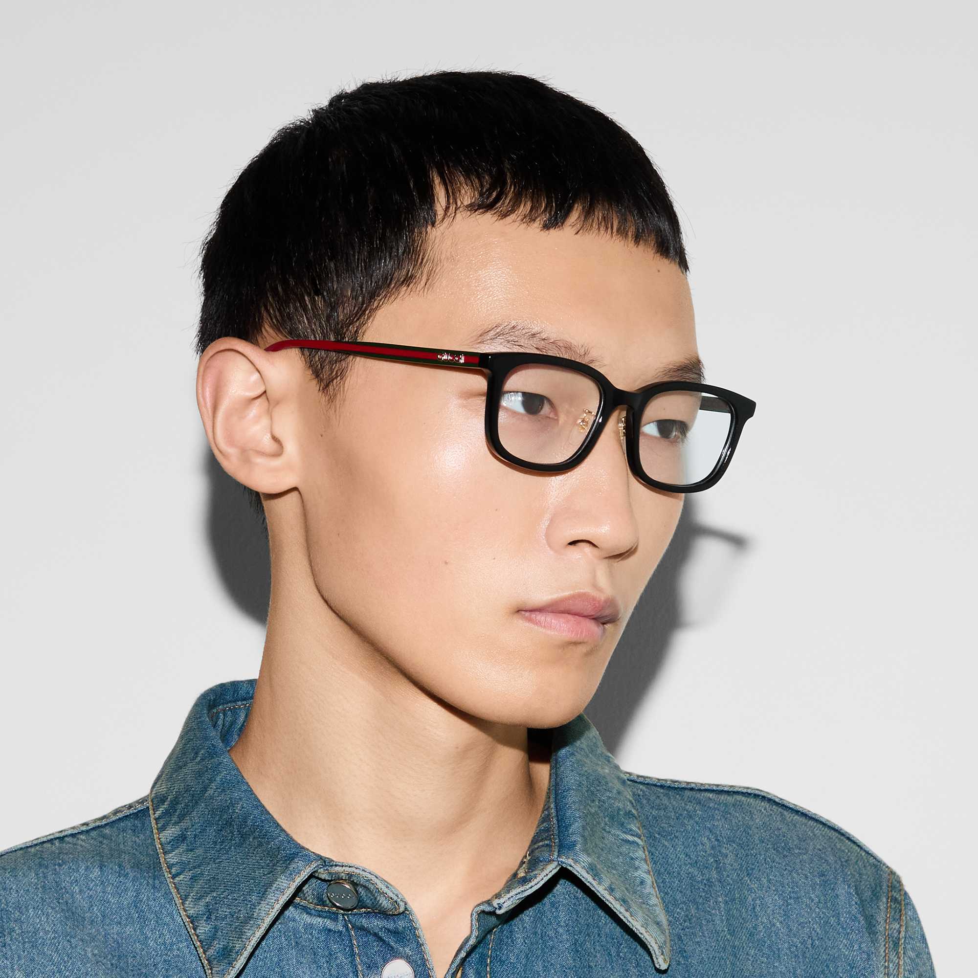 Black Gucci glasses with red