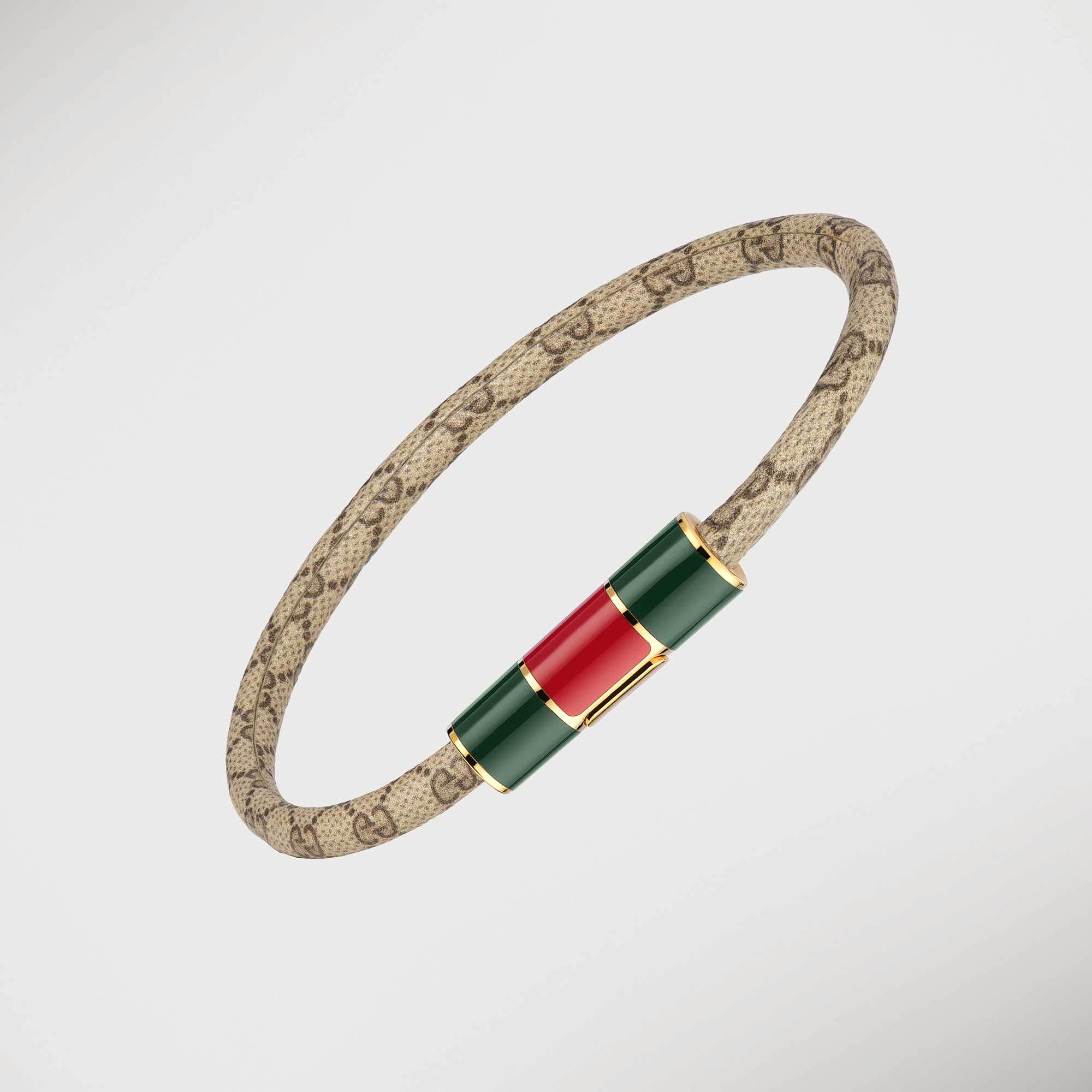 Gold Gucci bracelet, monogram outfit