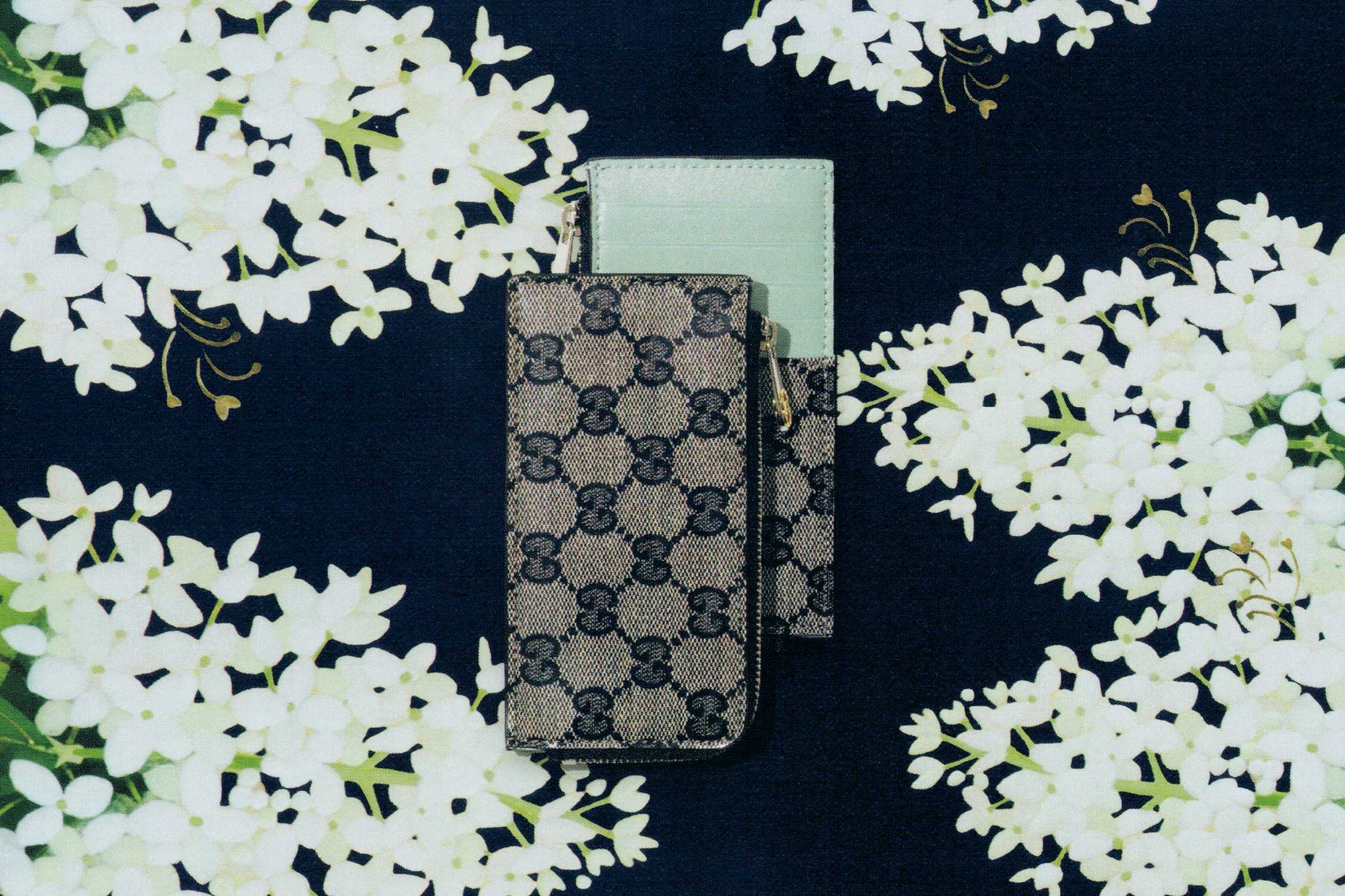 Gucci wallets and black sunglasses