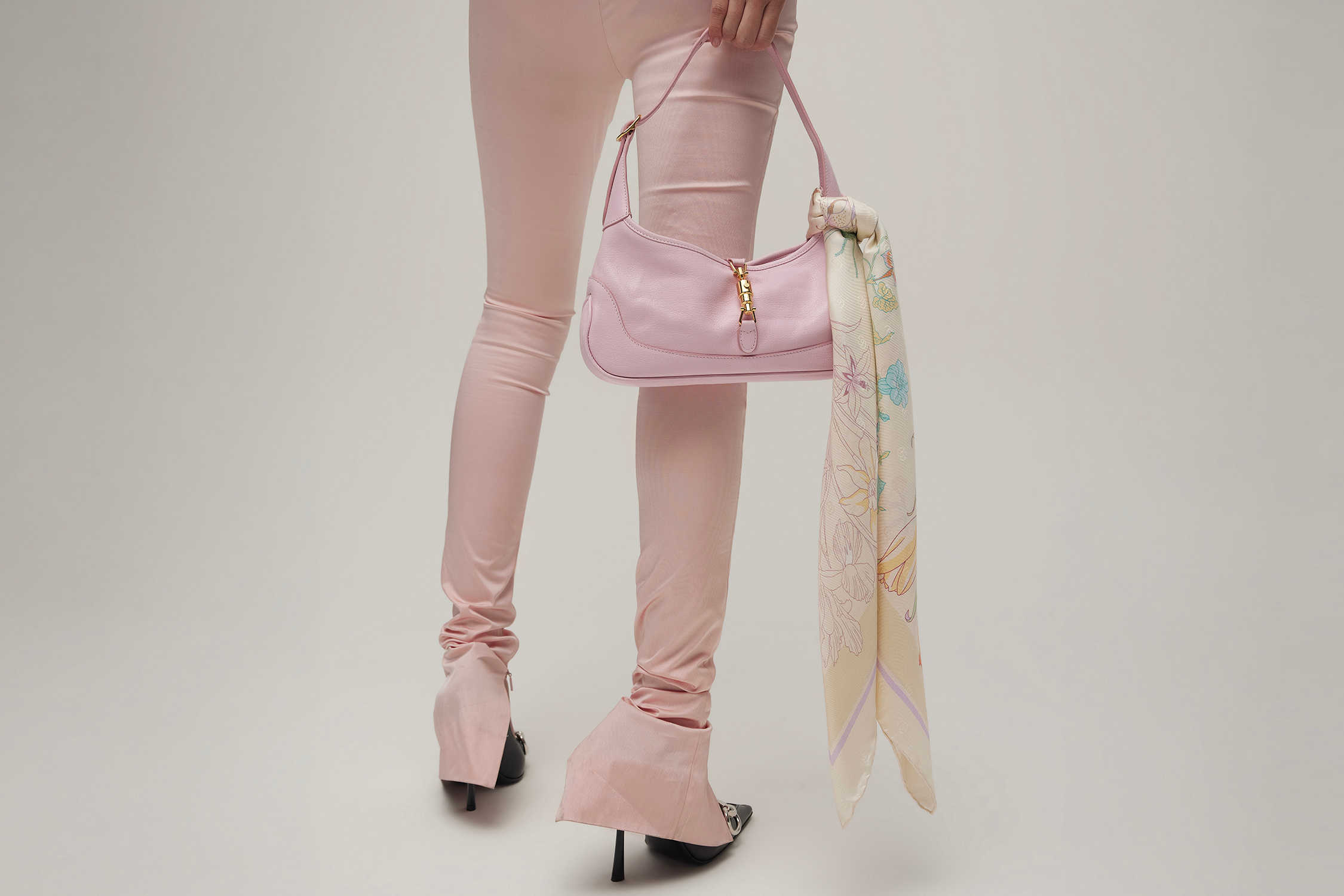 Pink Gucci bag with scarf