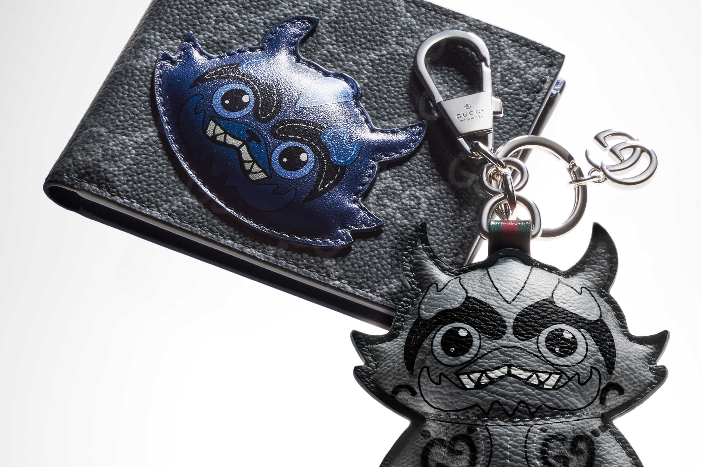 Gucci wallet with monster keychain