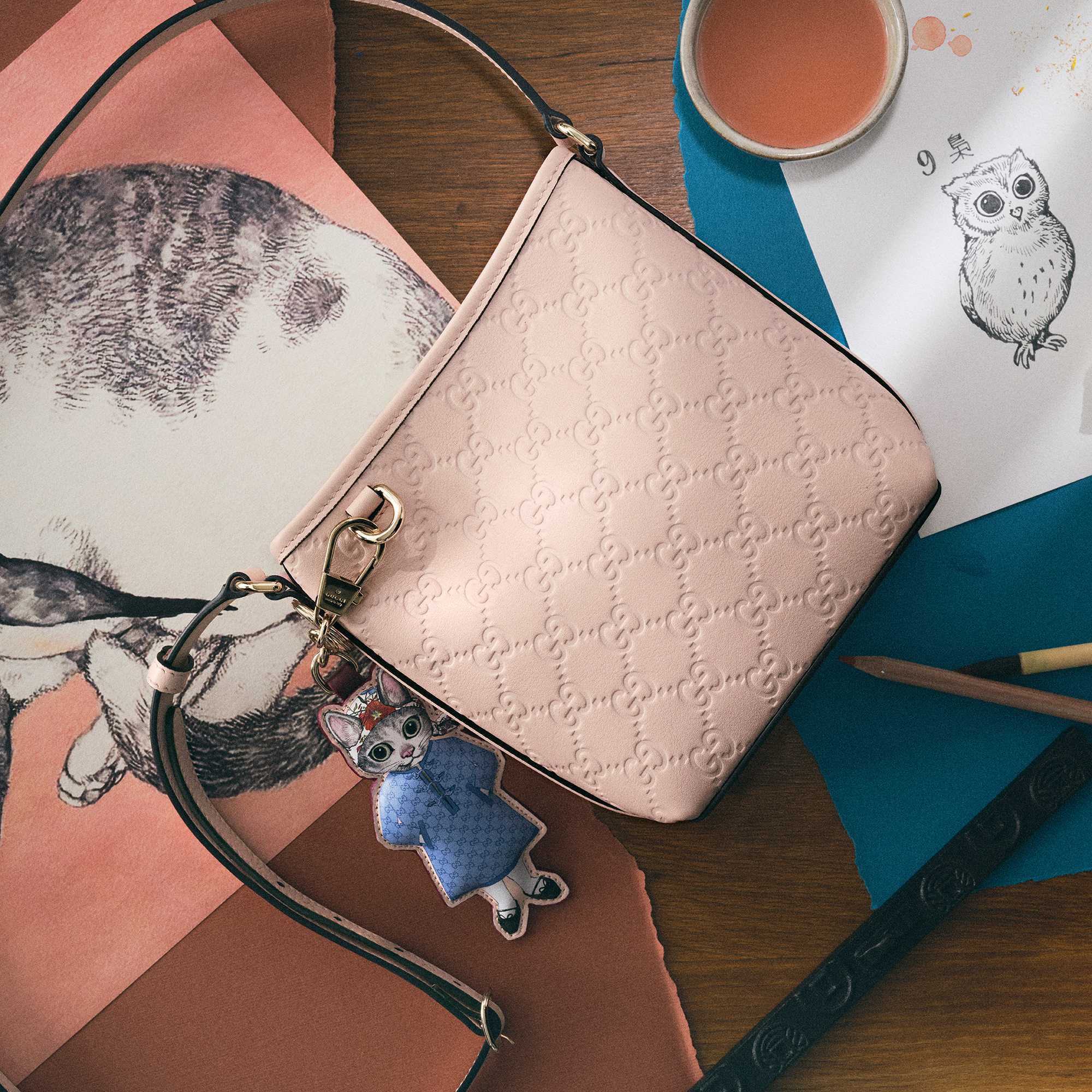 Pink Gucci bag with chain