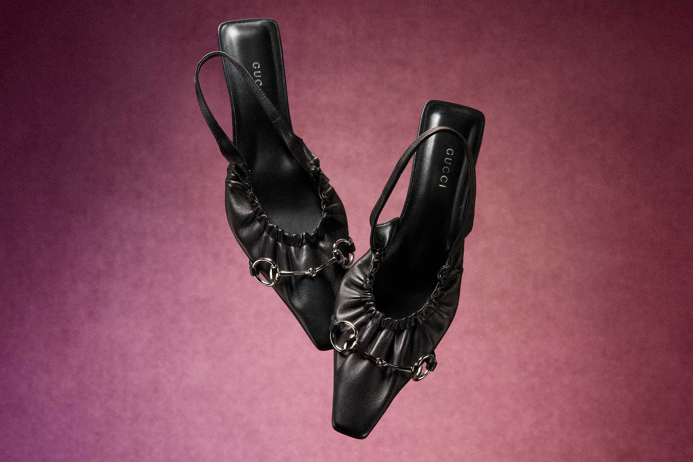 Black Gucci slingback heels pair