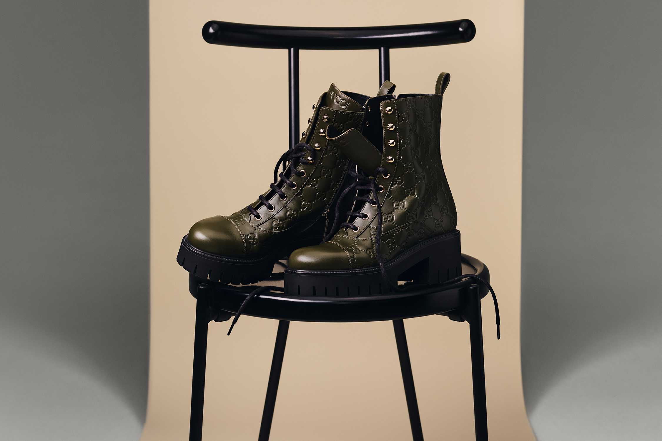 Green Gucci monogram combat boots