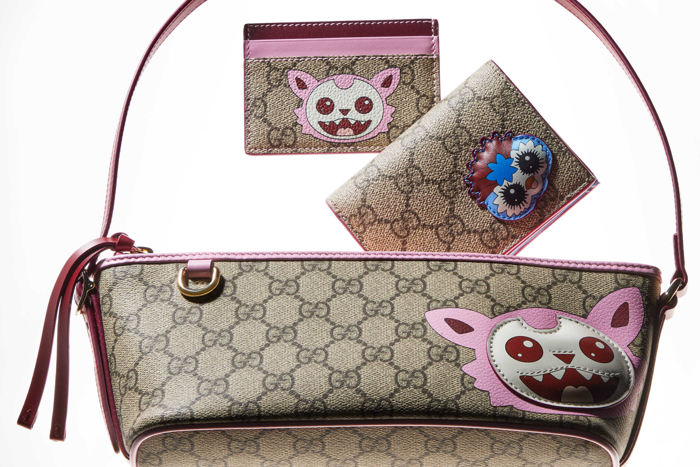 Gucci cartoon-themed pink monogram accessories