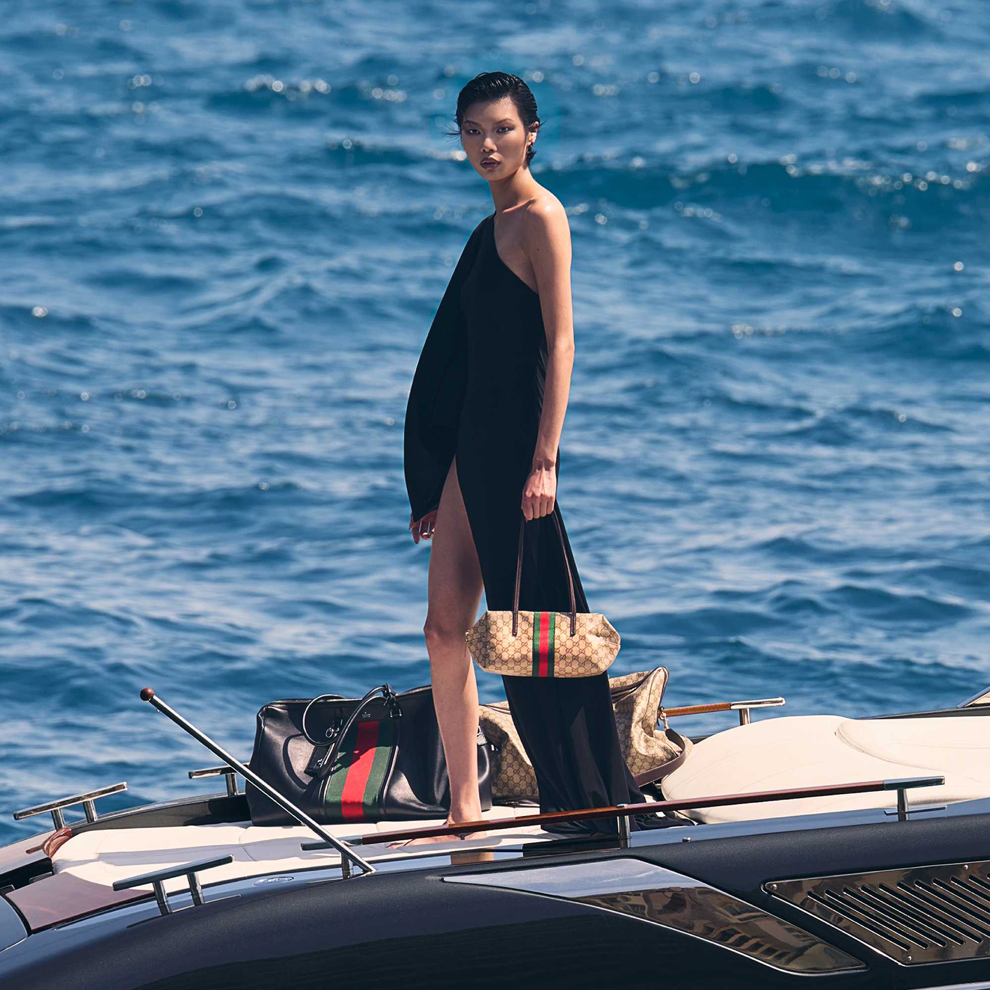 Black Gucci quilted handbag featured.