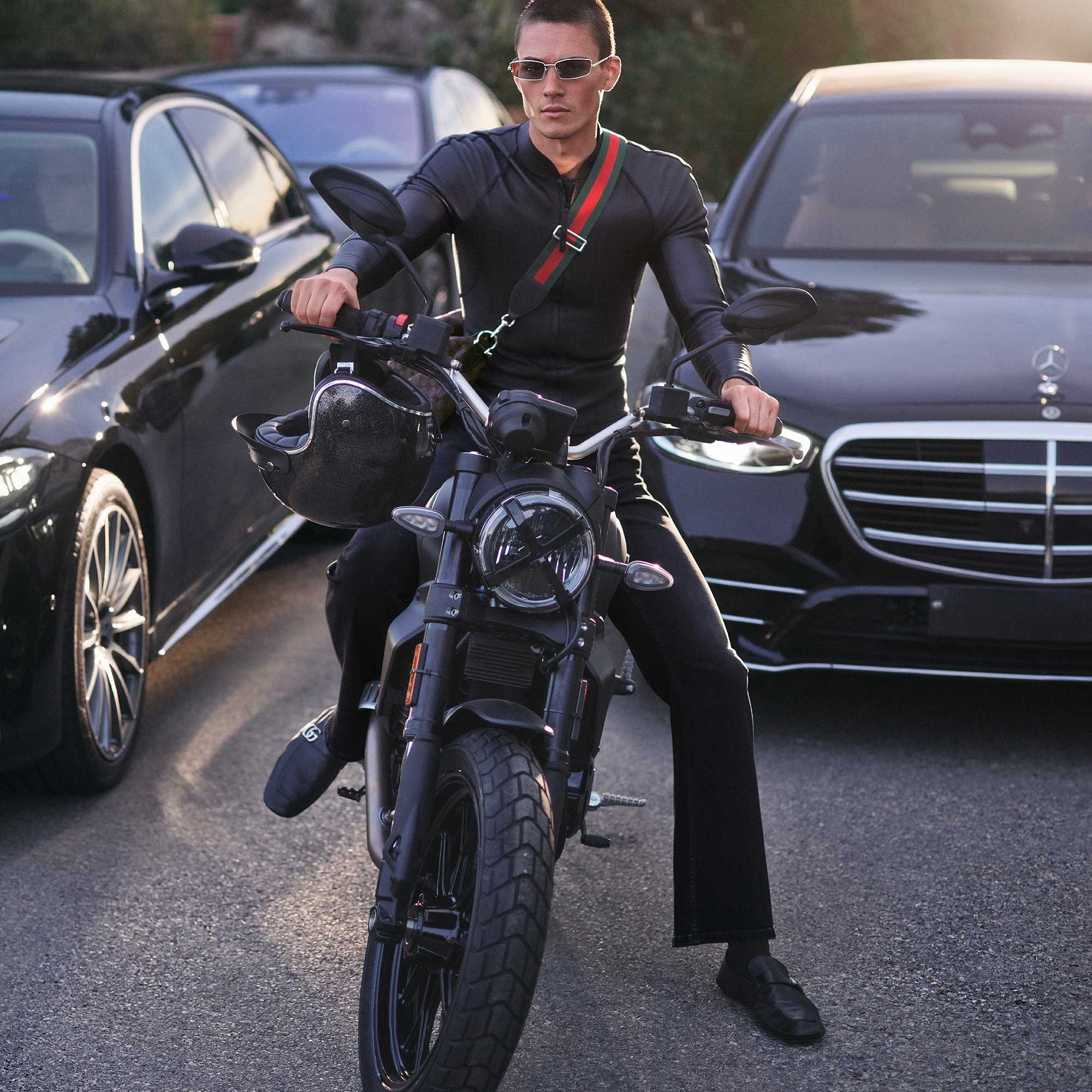 Gucci leather jacket and denim pants
