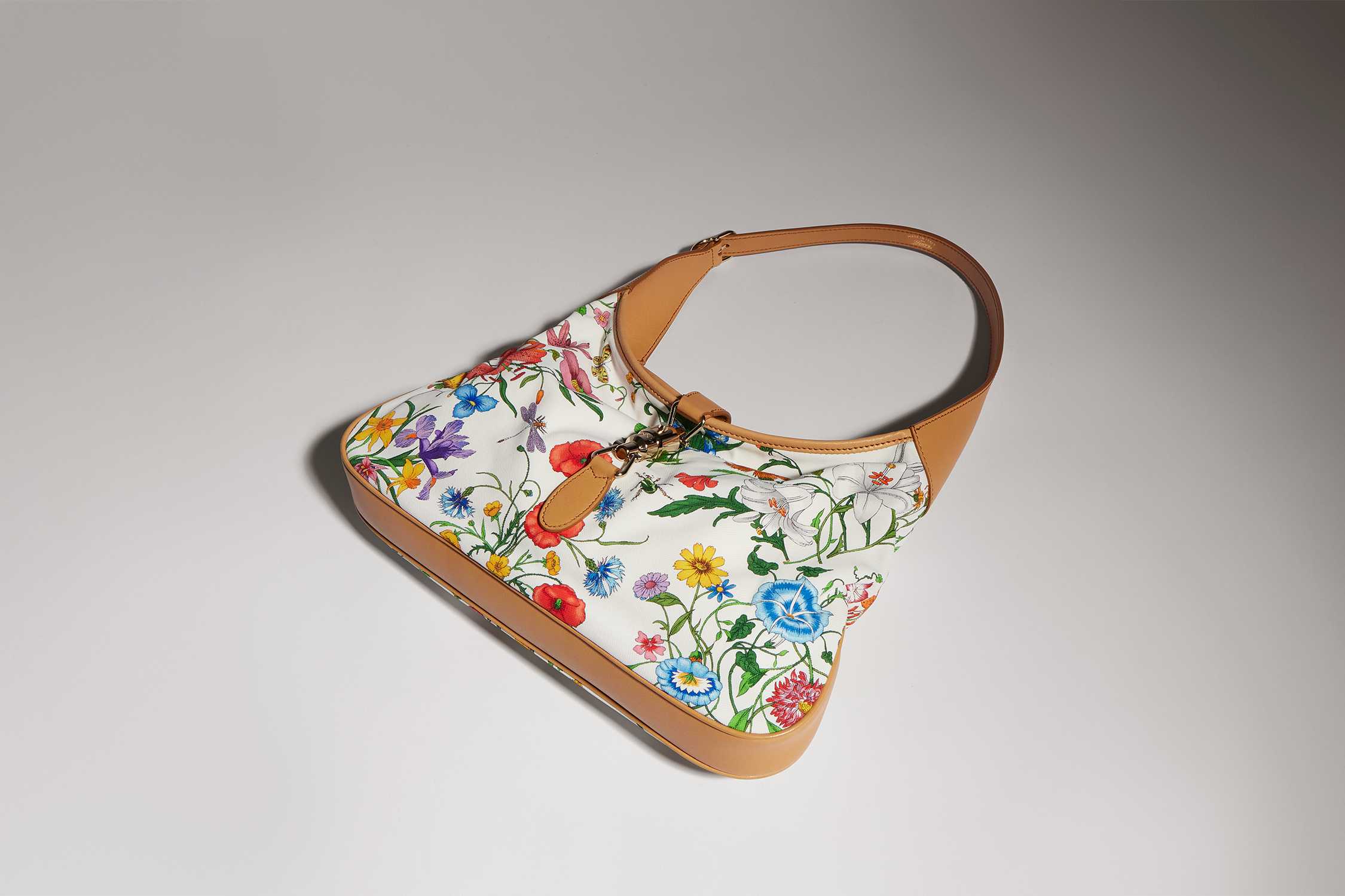 Gucci floral handbag with tan trim