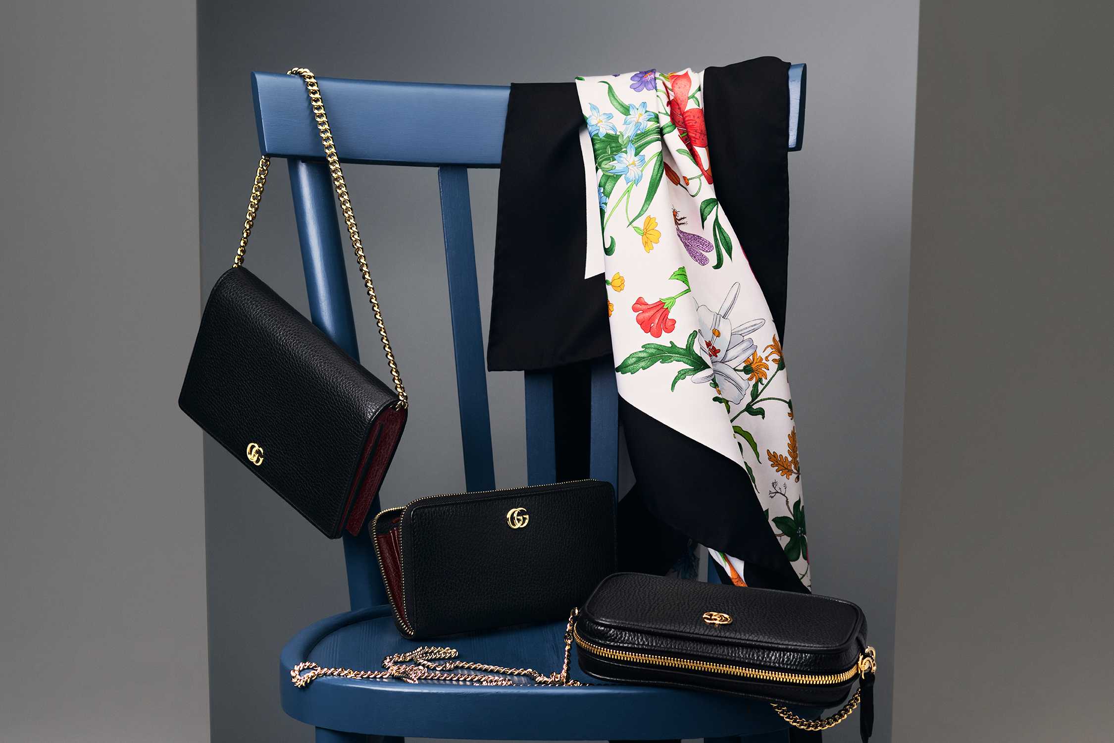 Black Gucci accessories with scarf