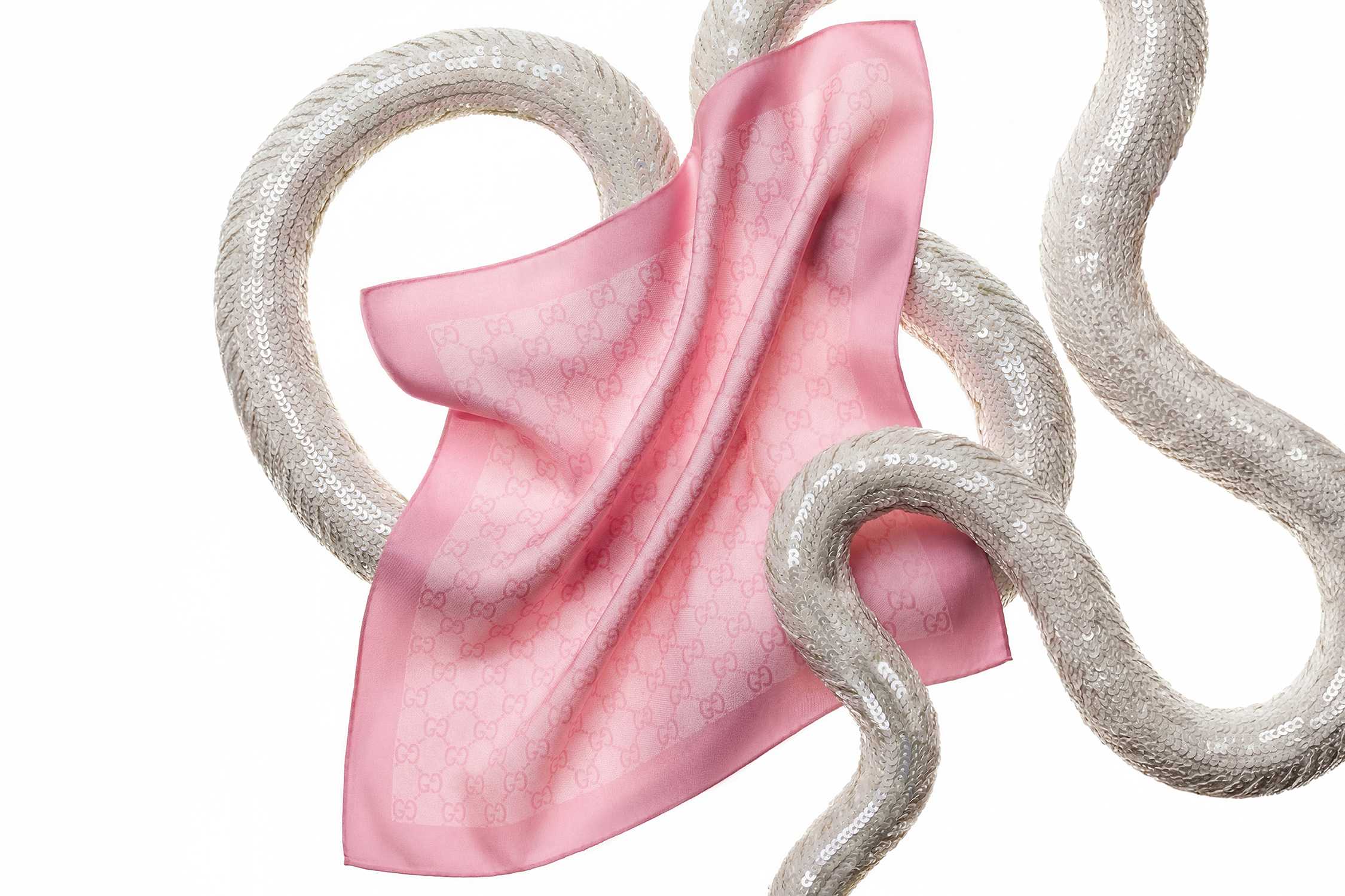 Pink Gucci scarf with sequins.