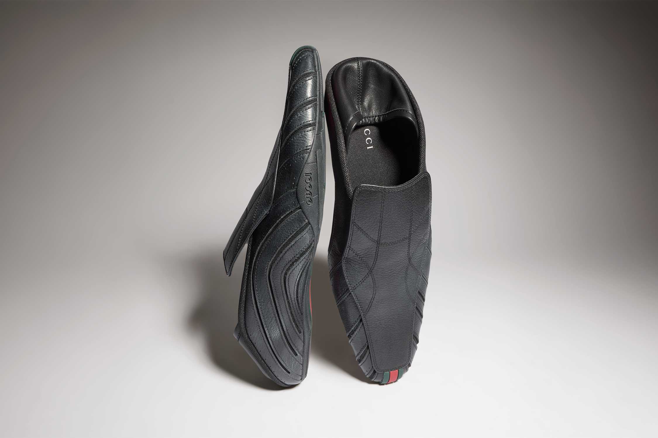 Black Gucci leather slip-on shoes
