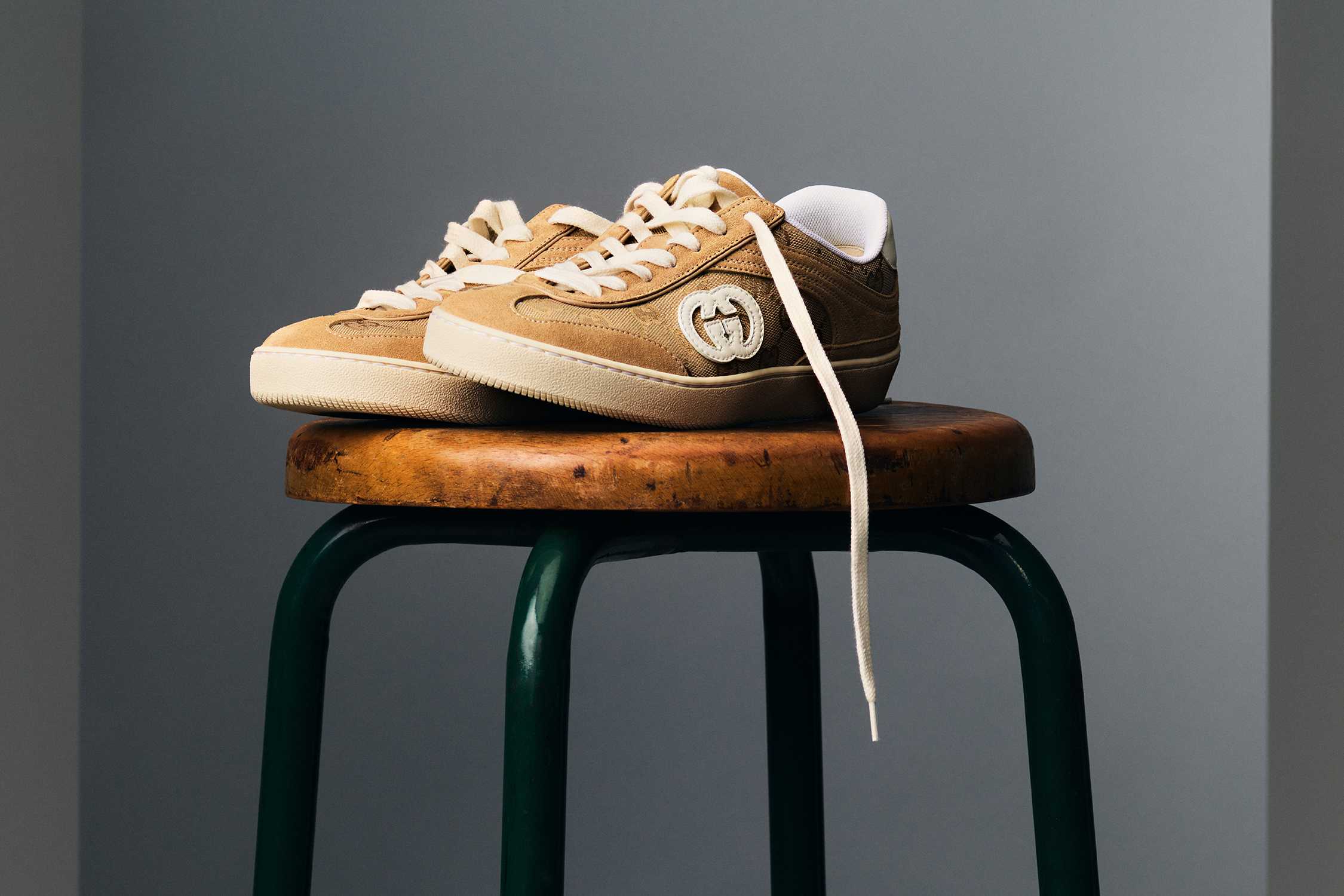 Tan Gucci sneaker on stool