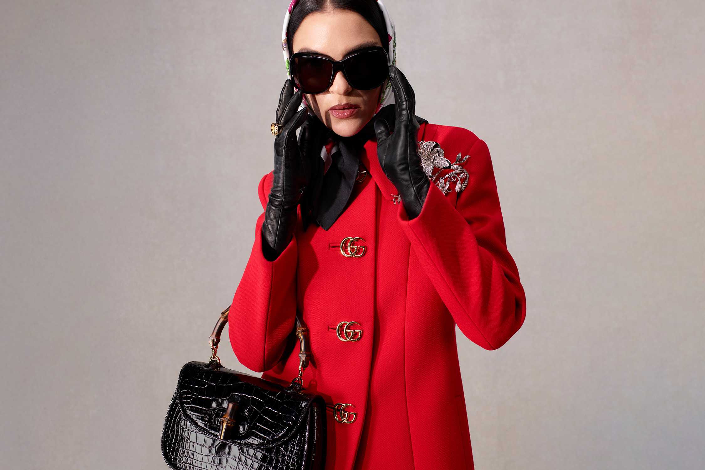 Red Gucci coat with accessories