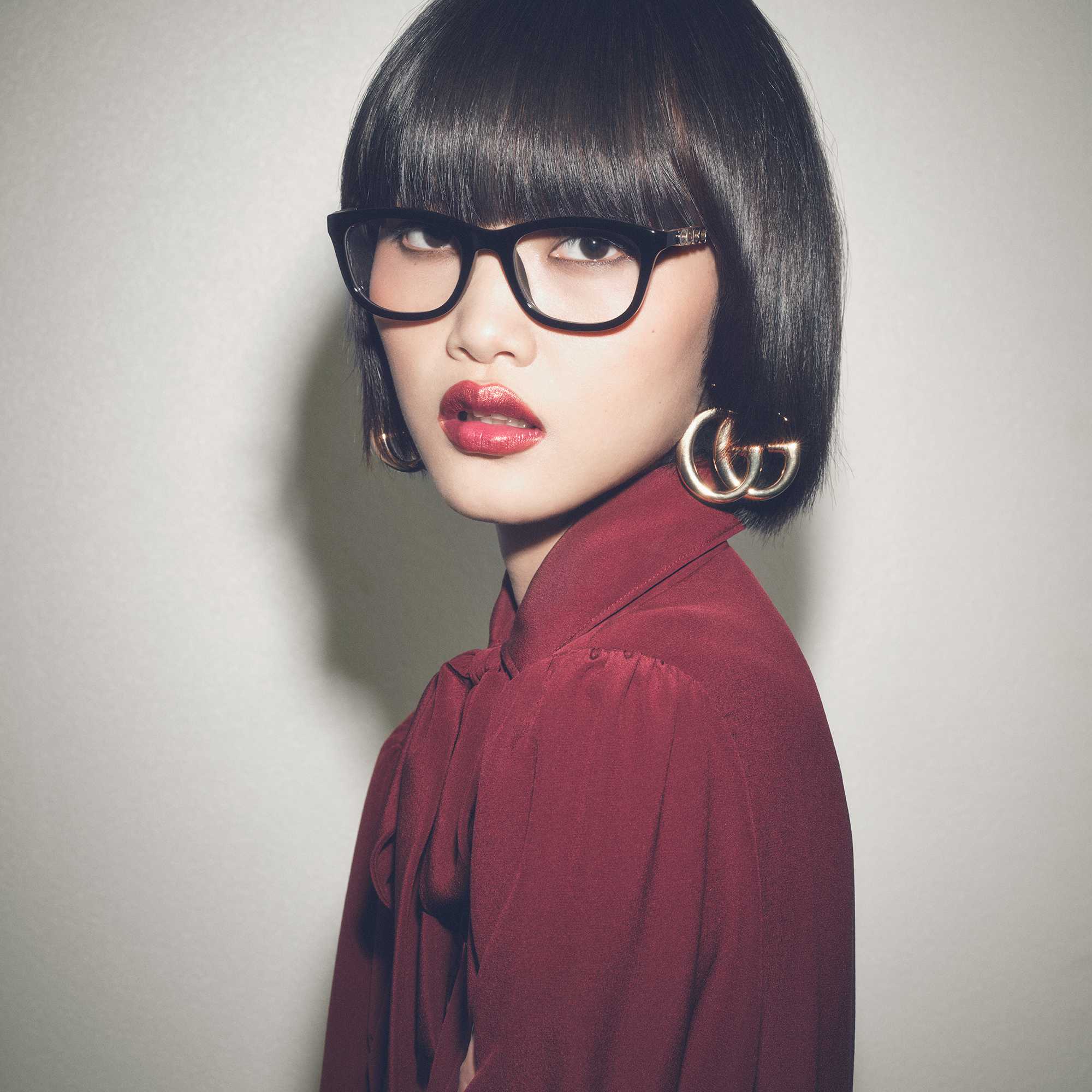 Gucci glasses with burgundy jacket