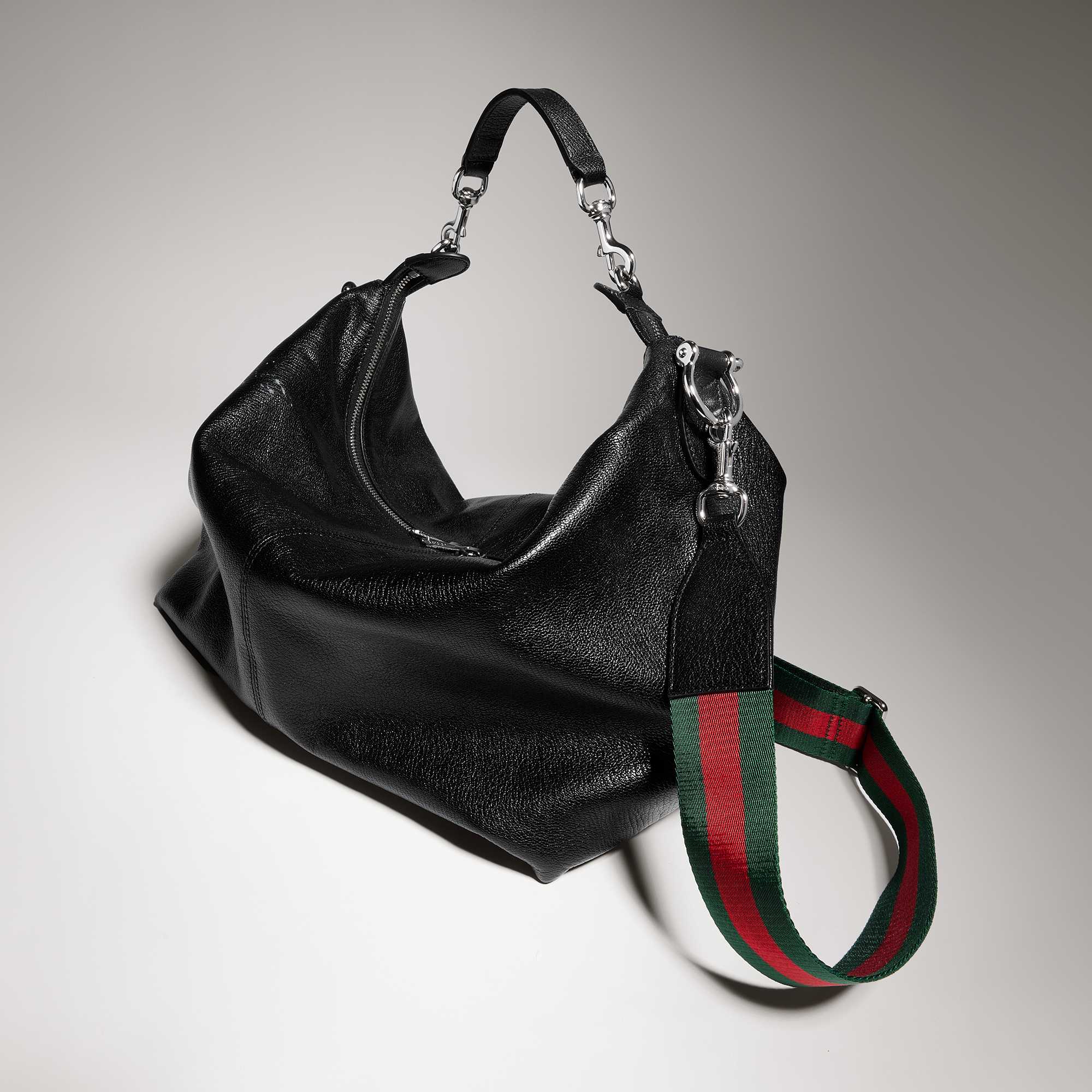 Black Gucci bag red green strap