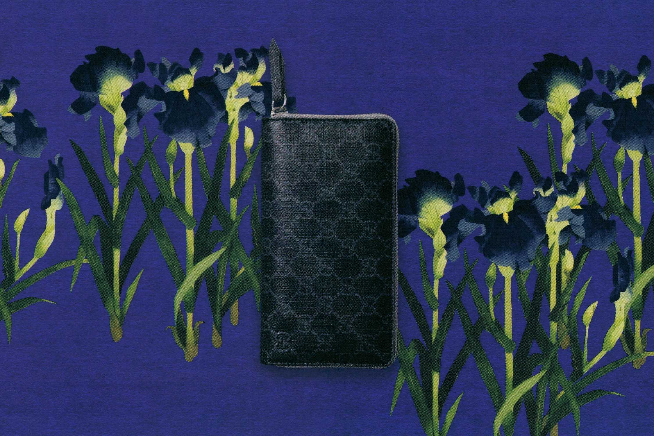 Black Gucci GG zip wallet