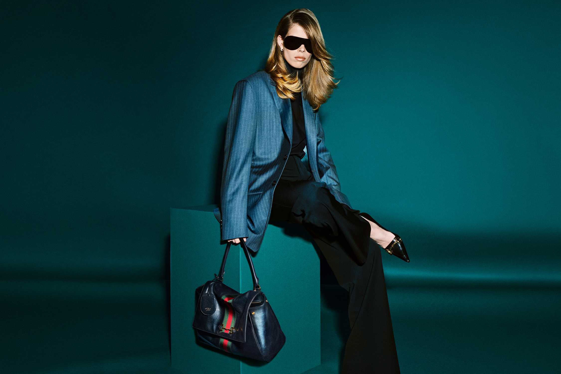 Gucci black handbag with stripes