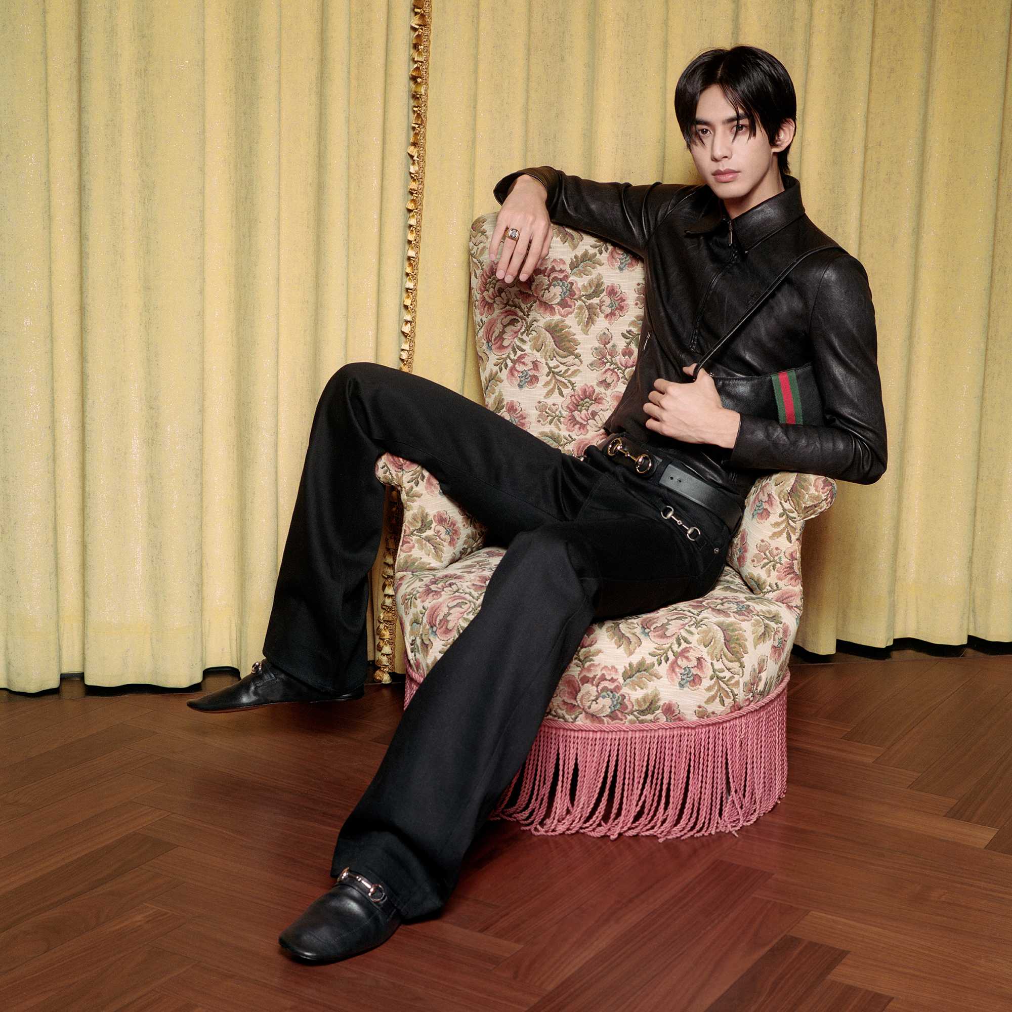 Black Gucci leather jacket ensemble.