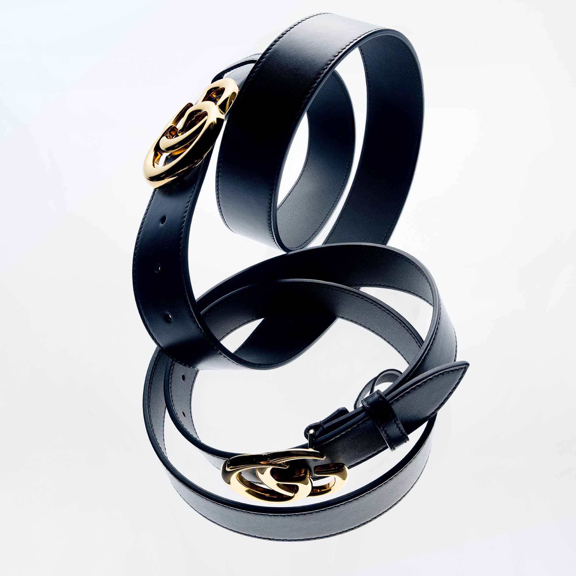 Black Gucci belts gold buckles