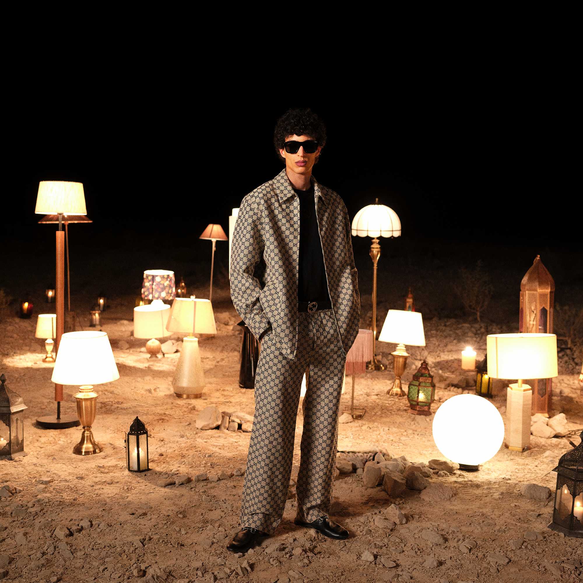 Beige Gucci monogram suit ensemble.