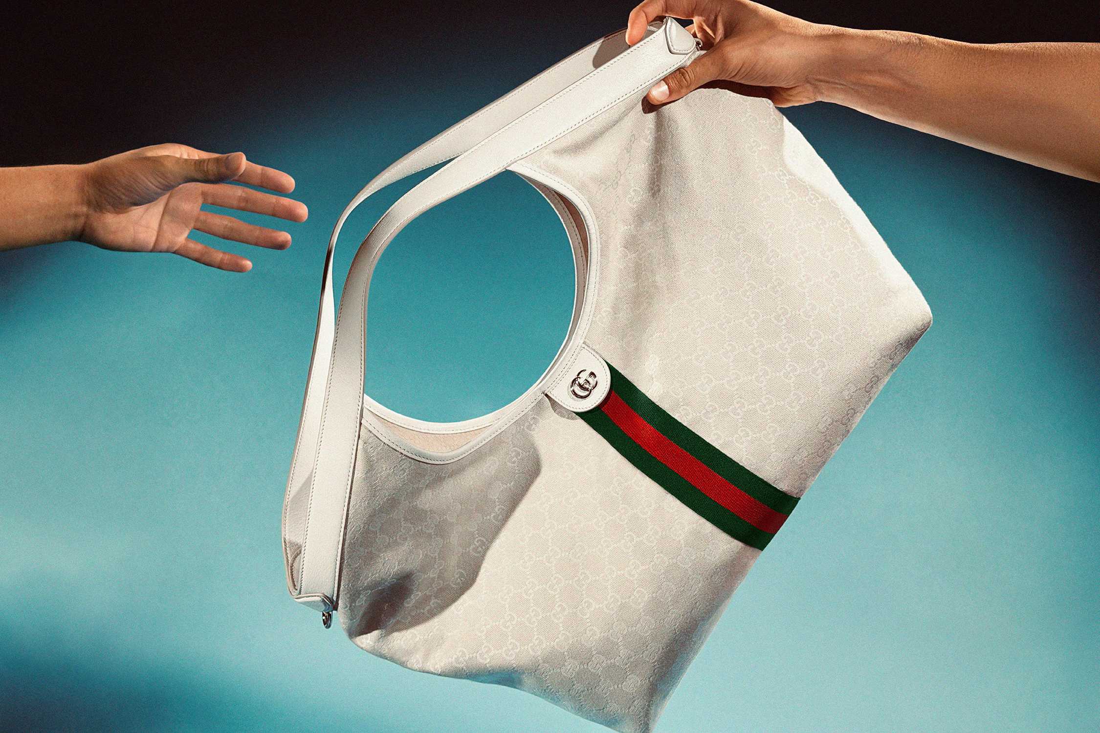 White Gucci bag with stripes