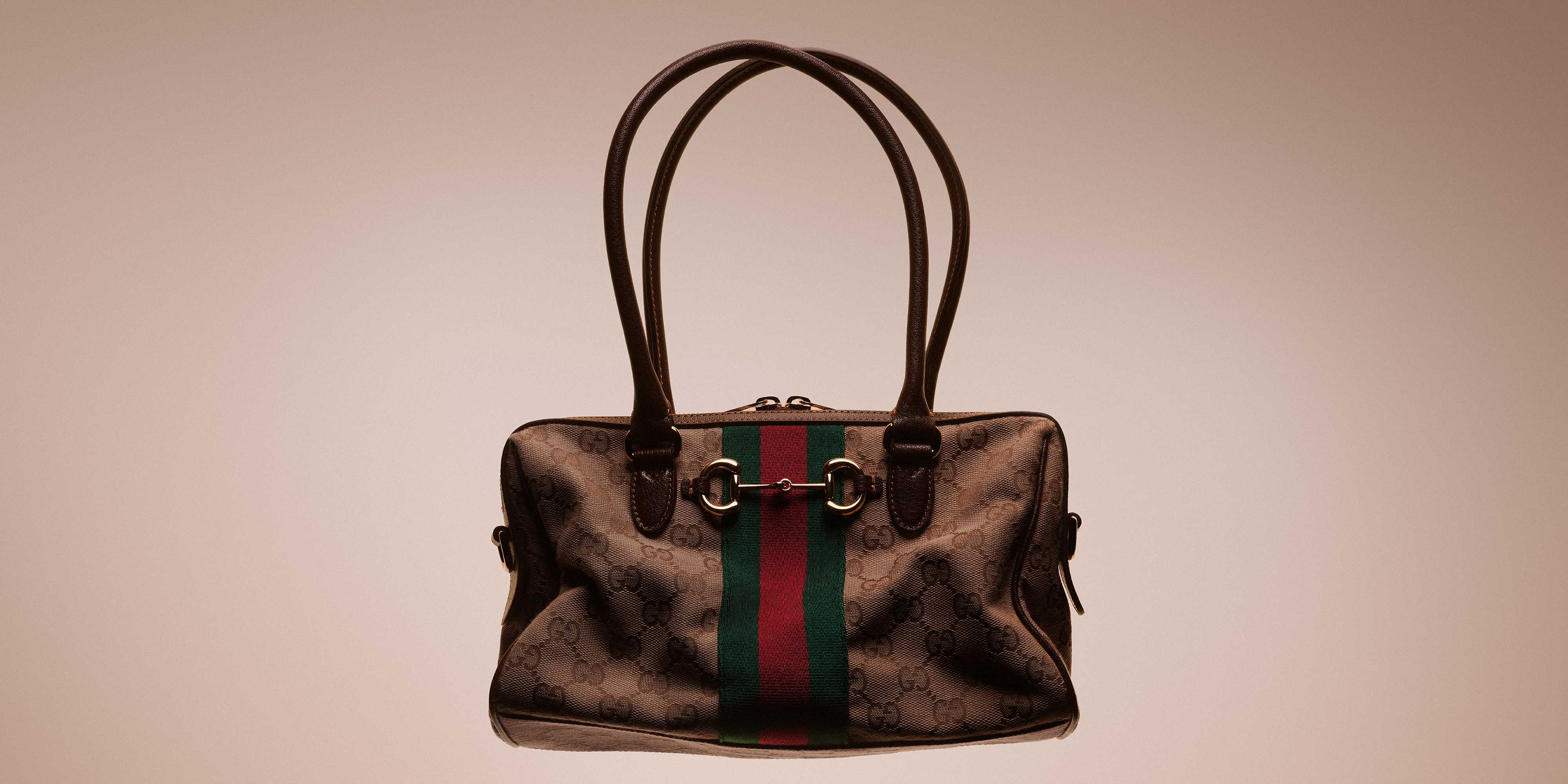 Brown Gucci handbag with stripes.