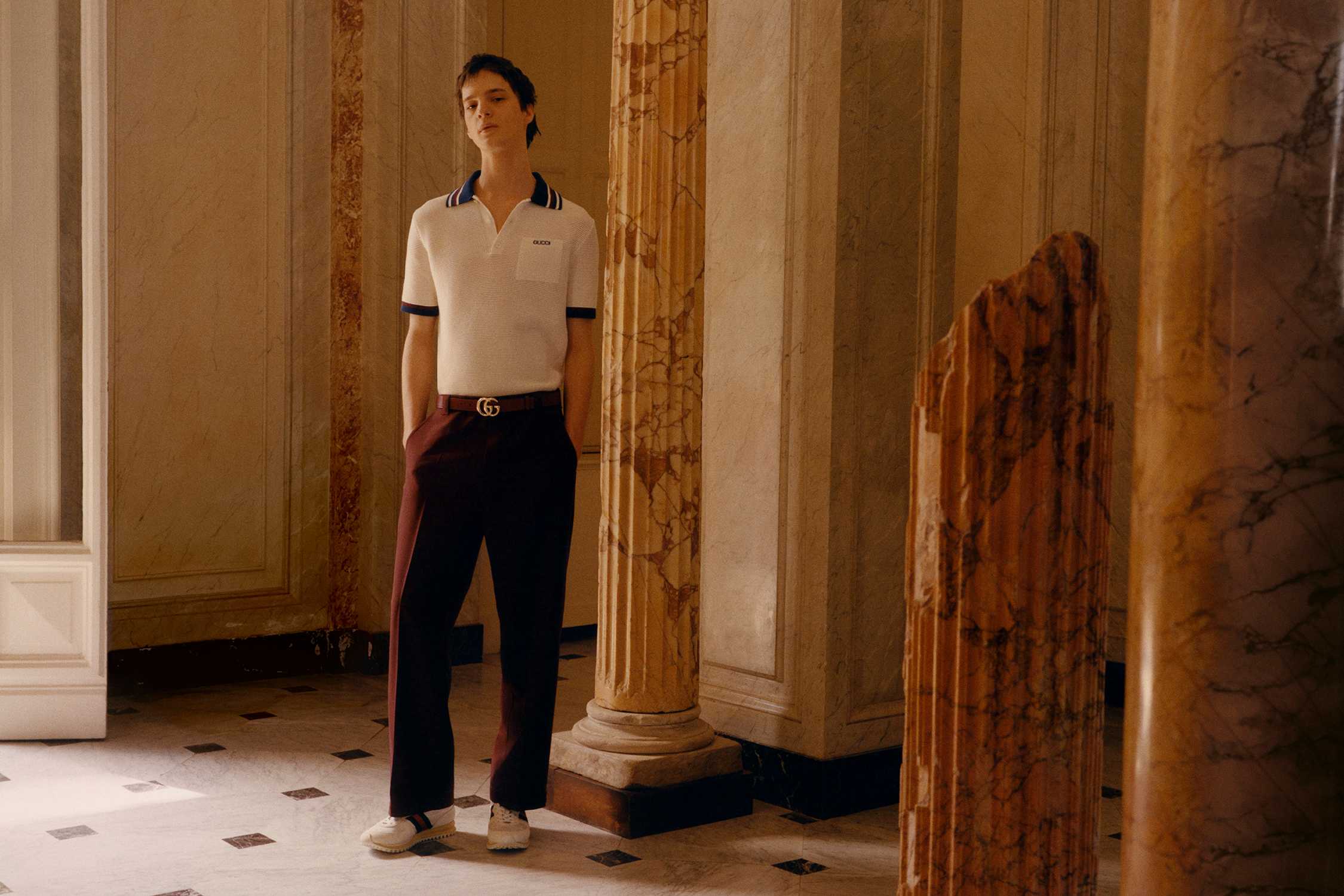 White Gucci polo with belt