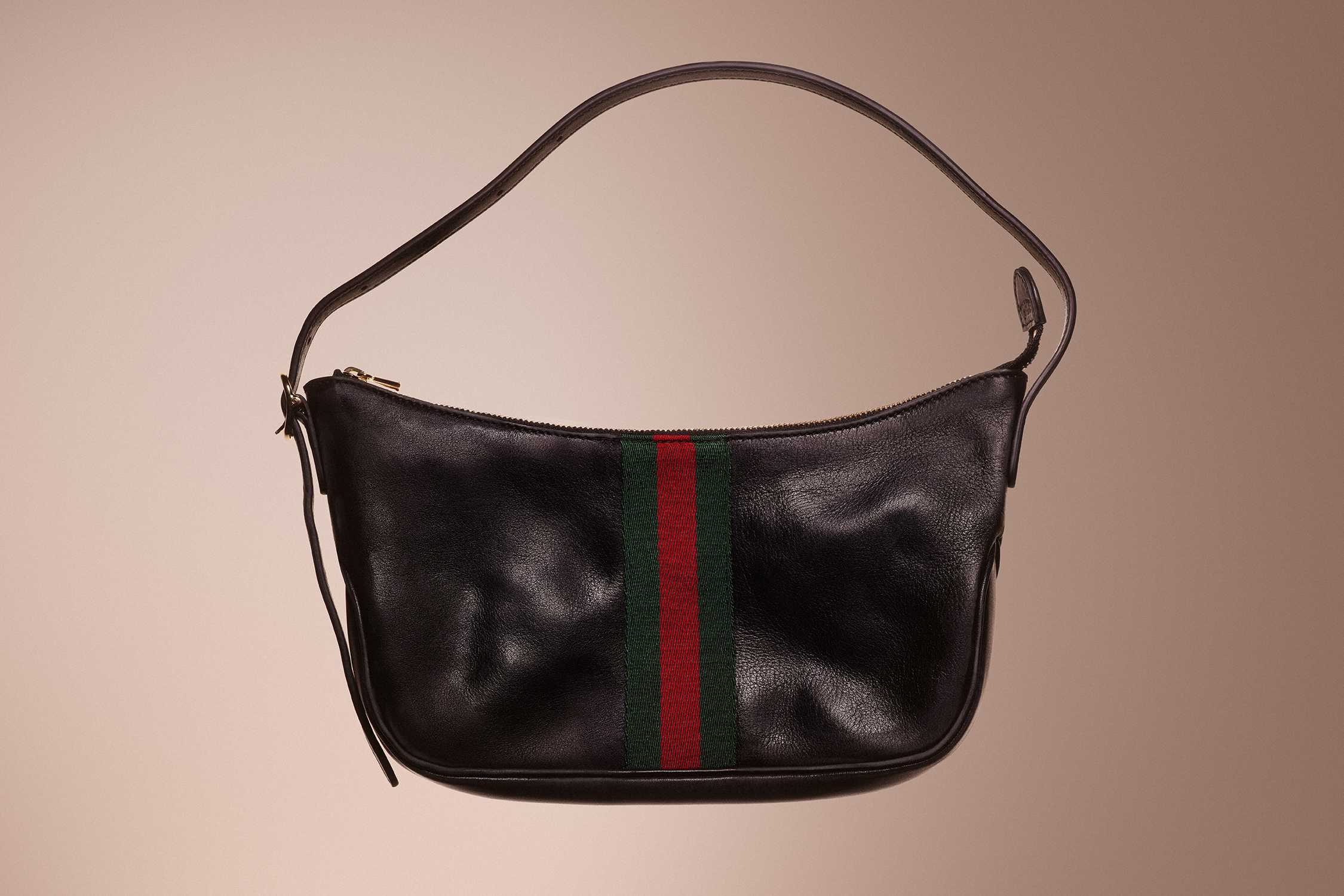 Black Gucci handbag with stripes