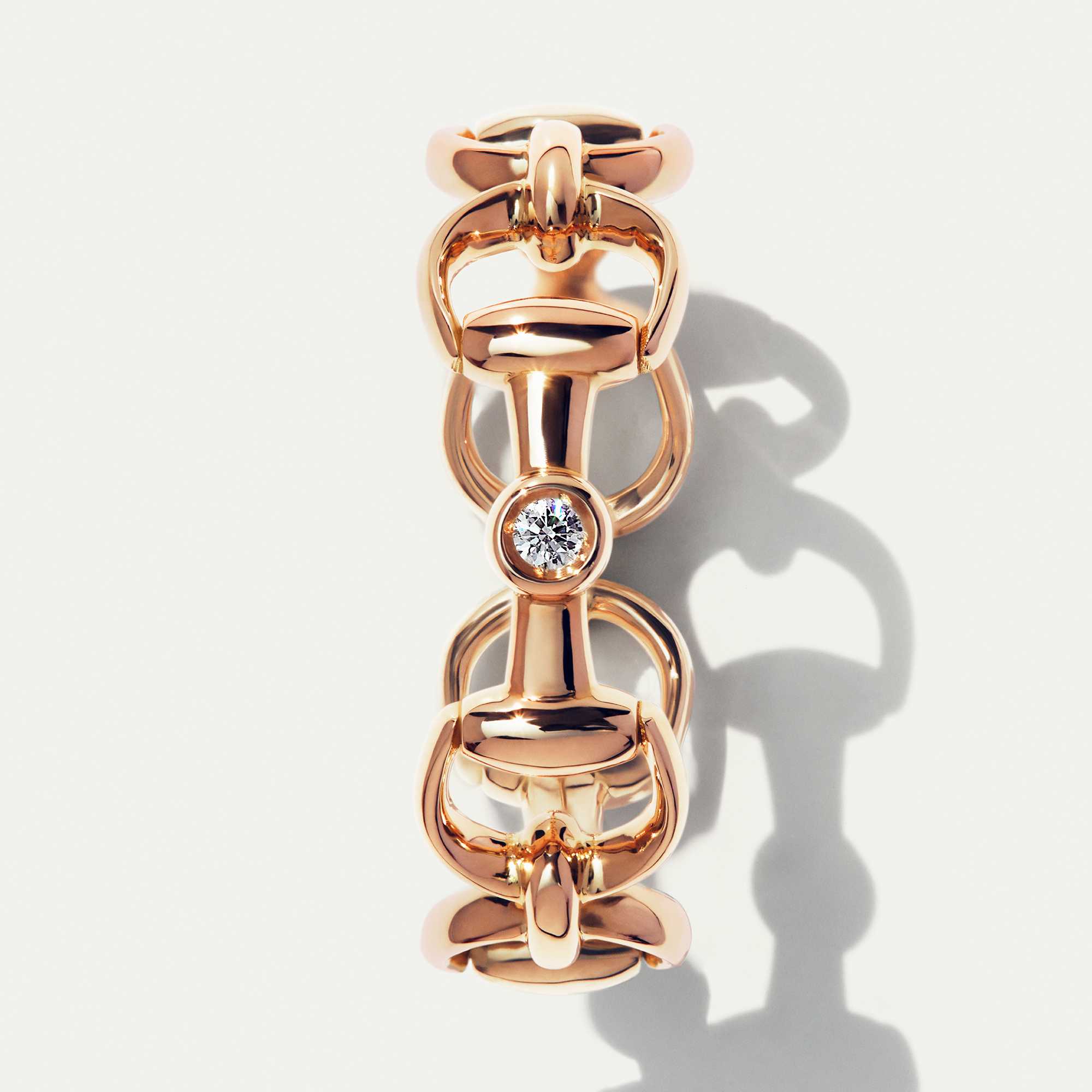 Gold Gucci spiral horsebit bracelet