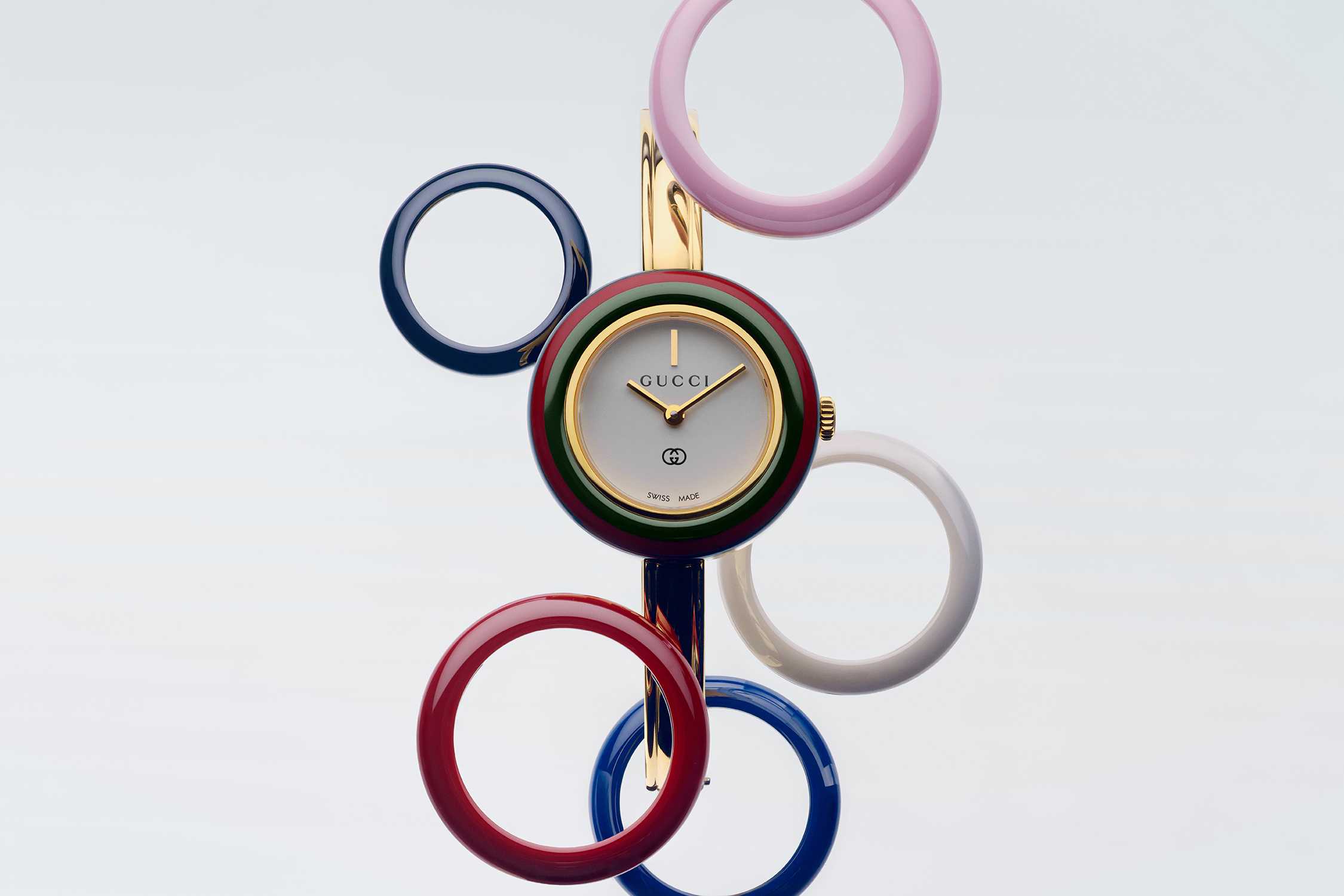 Colourful Gucci watch with interchangeable bezels
