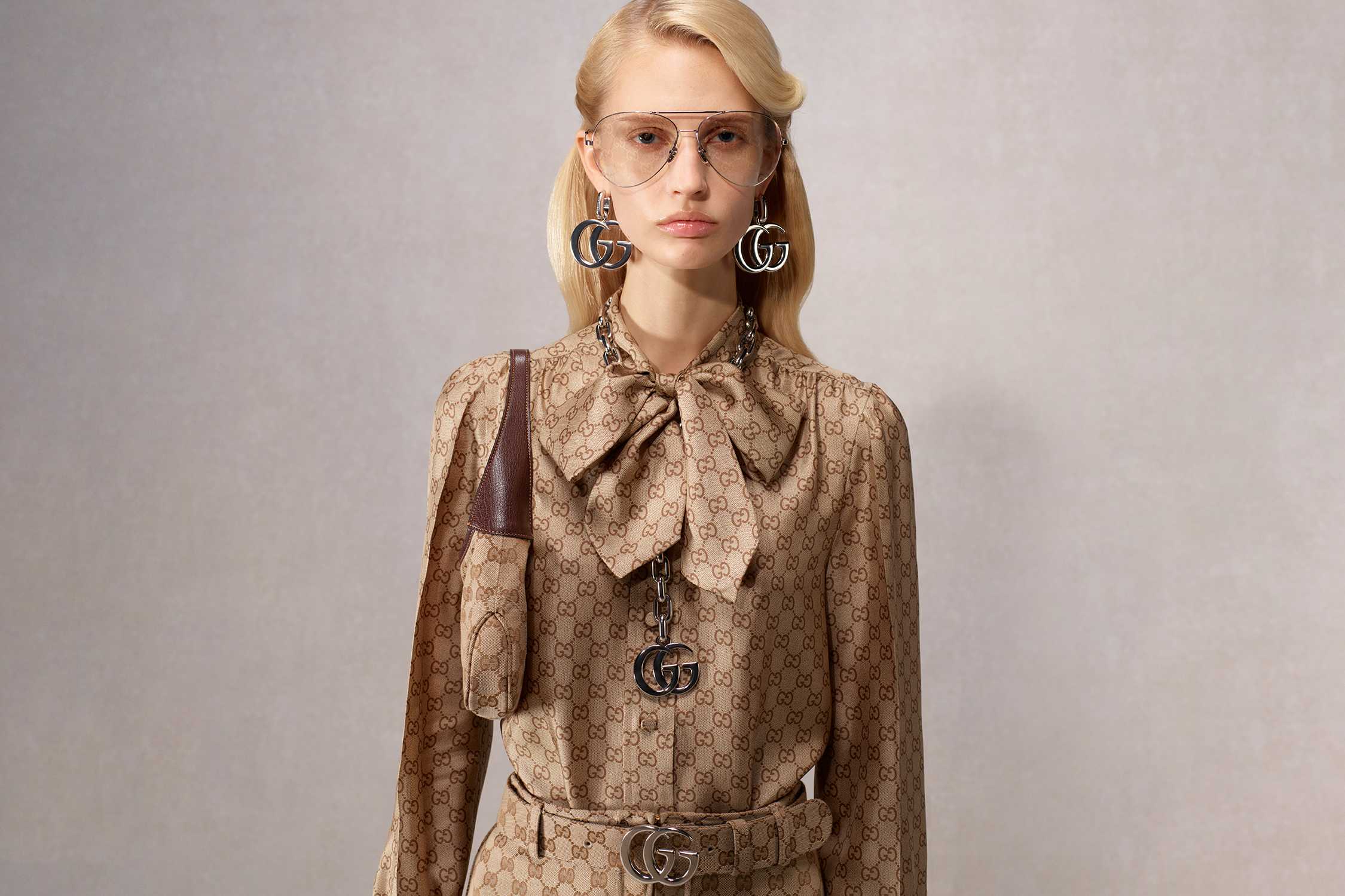 Beige Gucci outfit with accessories