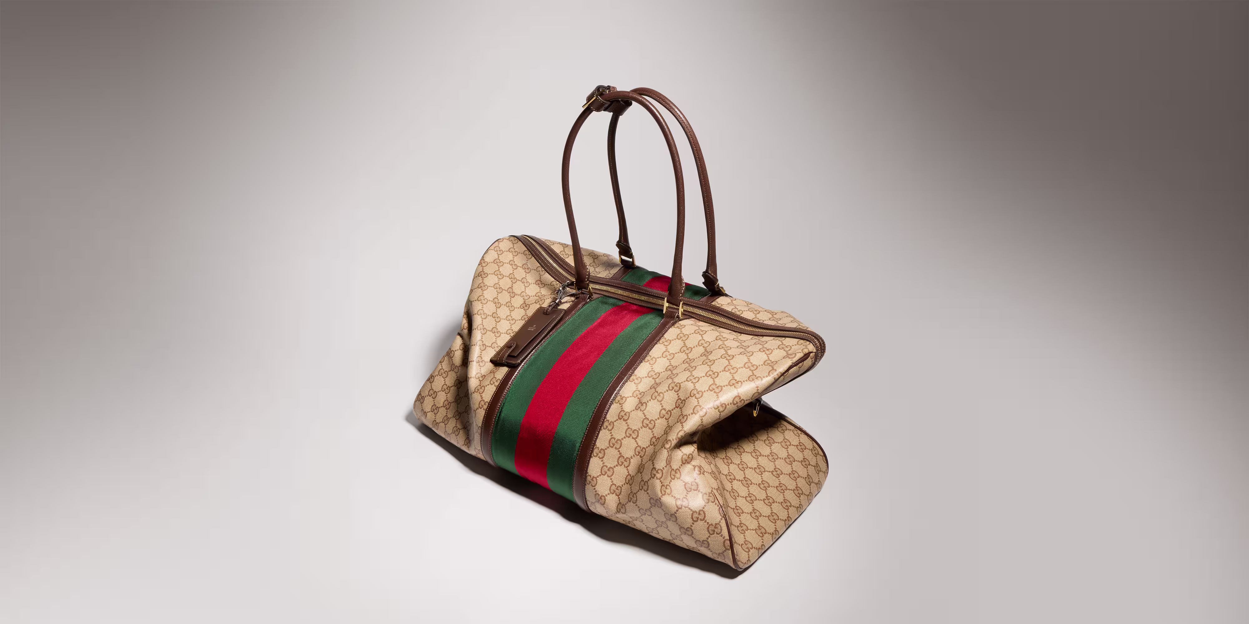 Green Gucci bag with coat