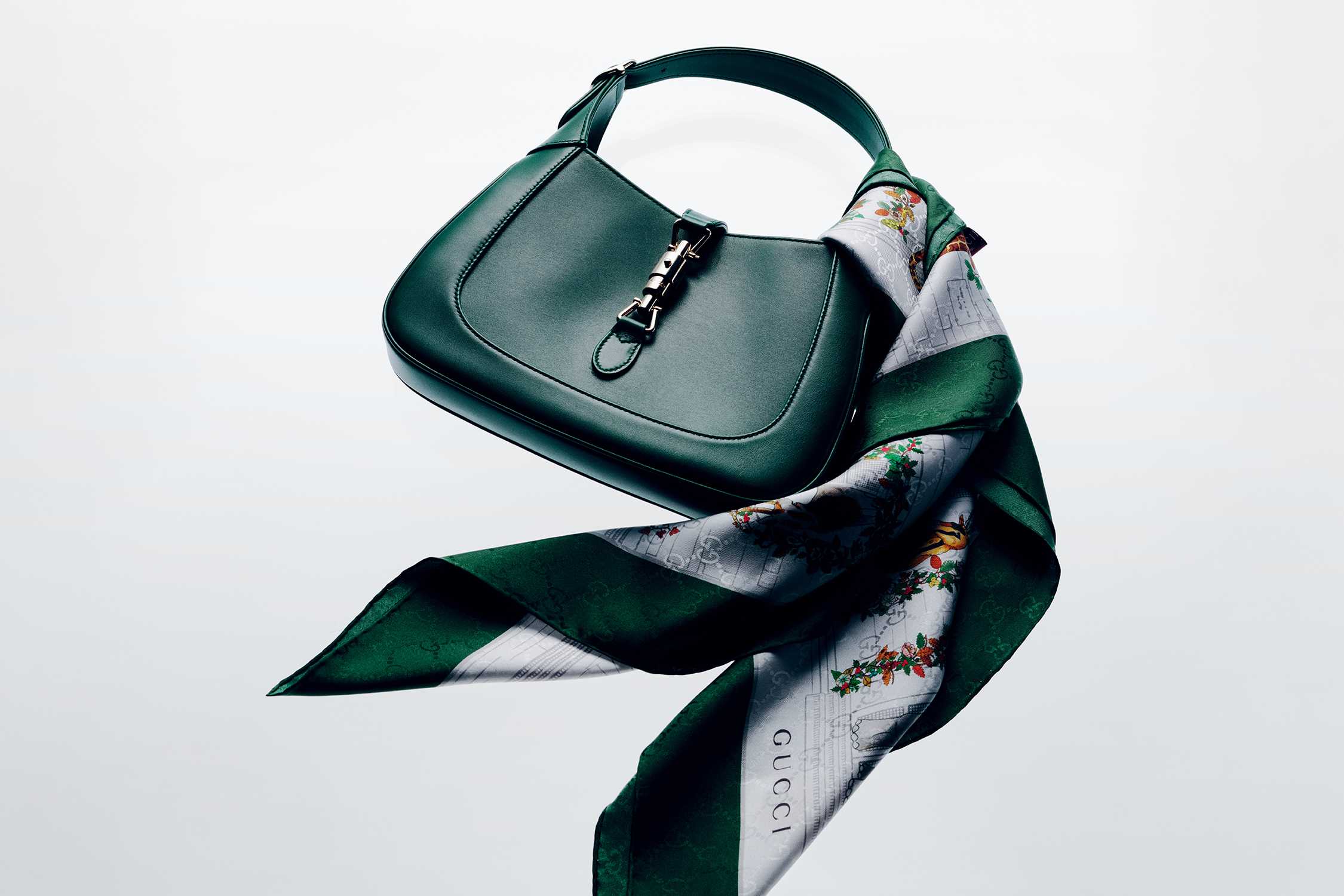 Green Gucci handbag with scarf