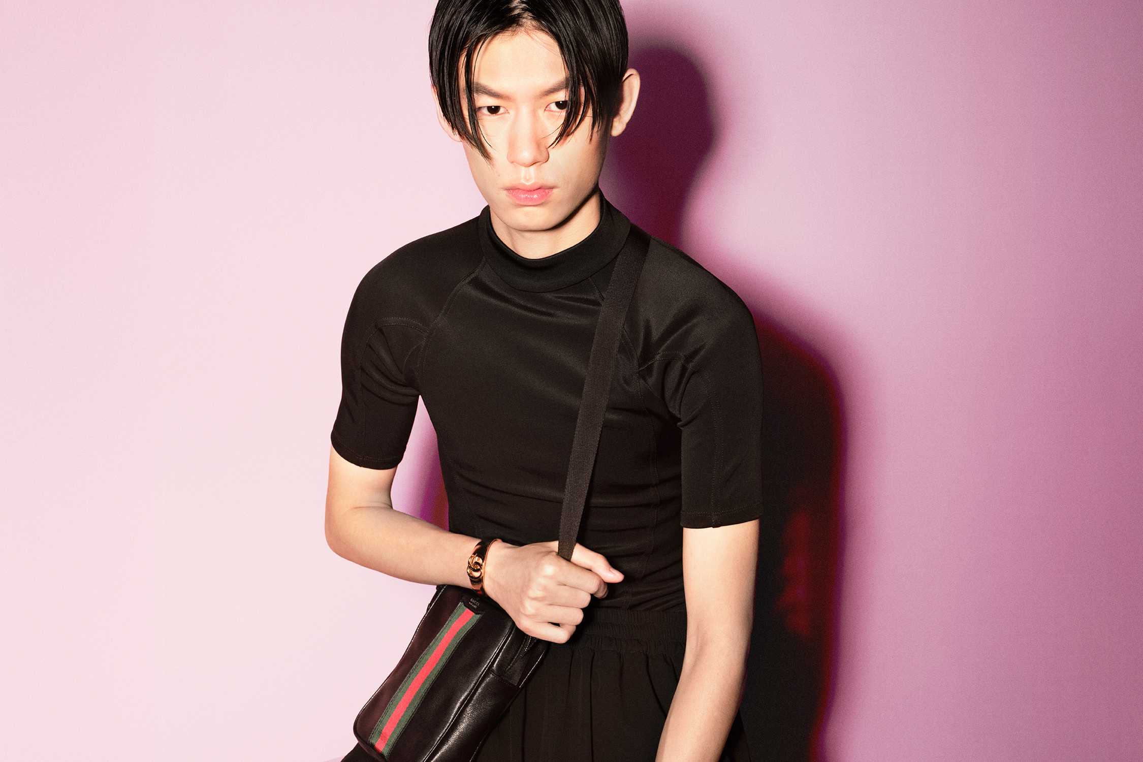 Black Gucci bag with stripes