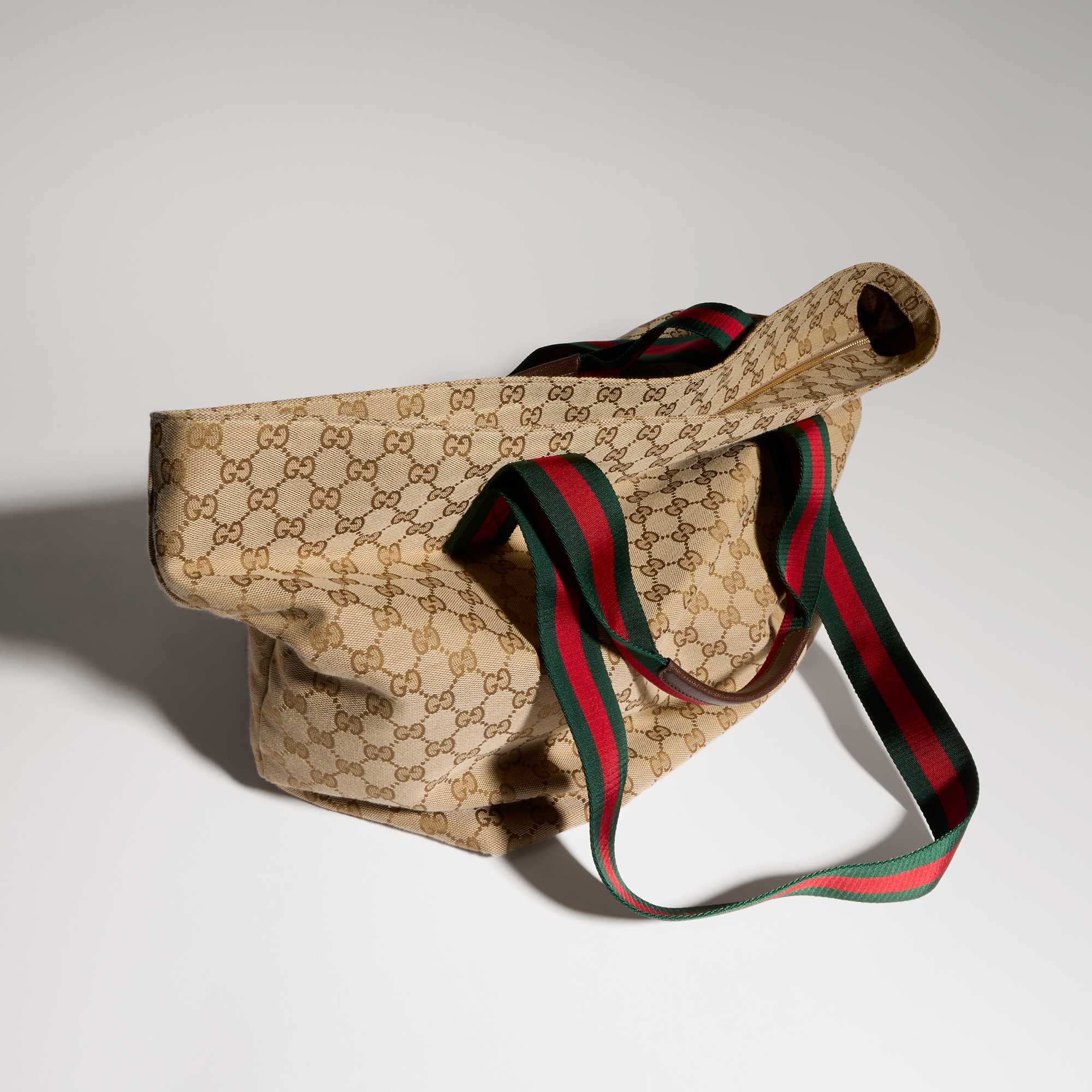 Gucci bag with red stripe